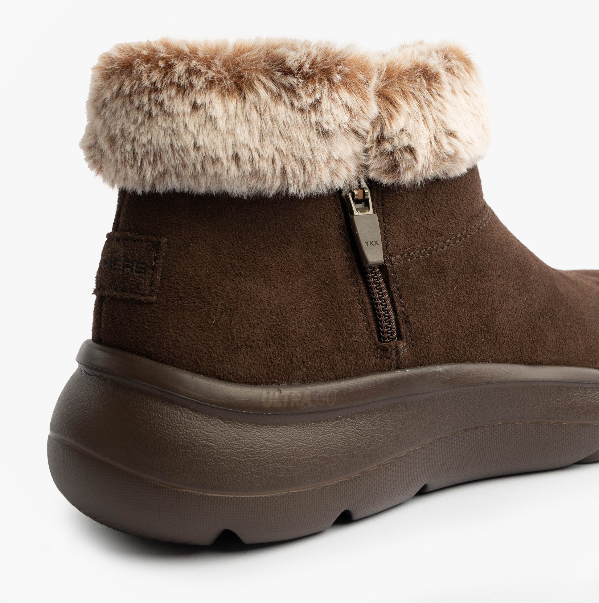 Skechers 144848/CHOC ON-THE-GO ENCORE - SNOW-CAPPE Womens Boots Chocolate side view with faux fur collar and zip closure.