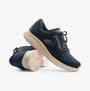 Skechers 150198/NVY SKECH-LITE PRO-THROUGH THE MUD Womens Trainers Navy side view showing lace-up design and rubber sole.
