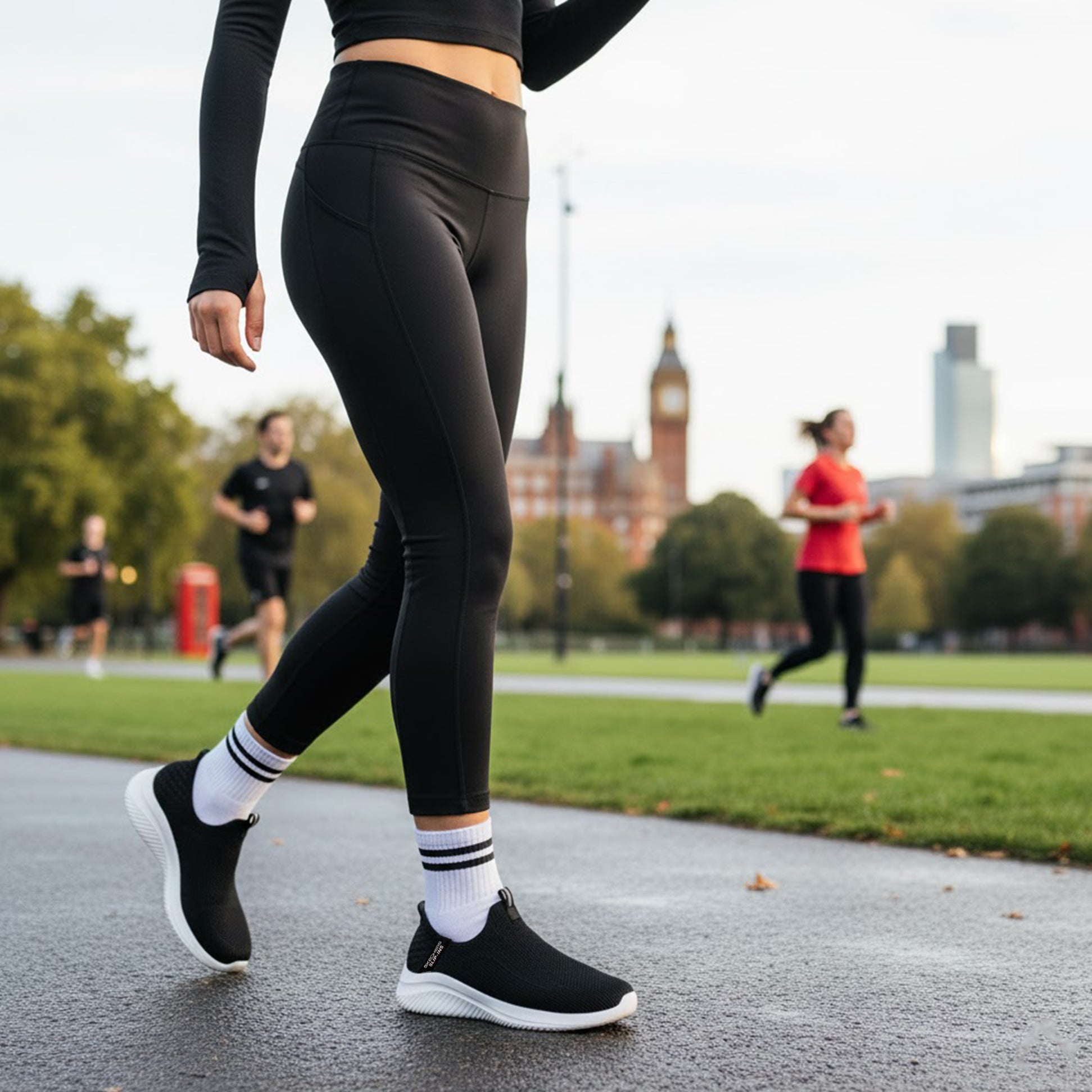Skechers 150450/BLK ULTRA FLEX 3.0-EASY WIN Womens Trainers Black side view worn by a runner in a park.