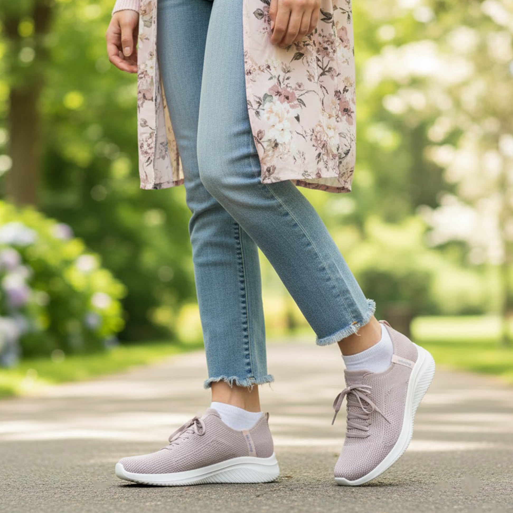 Skechers 150457/LTMV ULTRA FLEX 3.0-ELEVATED MOTION Womens Trainers Light Mauve side view with model wearing in a park.