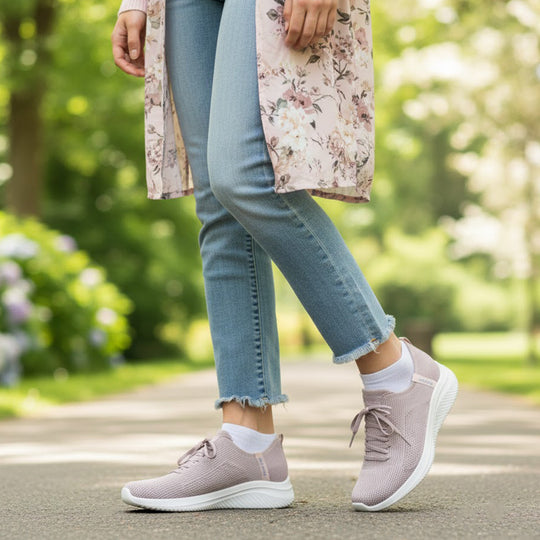 Skechers 150457/LTMV ULTRA FLEX 3.0-ELEVATED MOTION Womens Trainers Light Mauve side view with model wearing in a park.