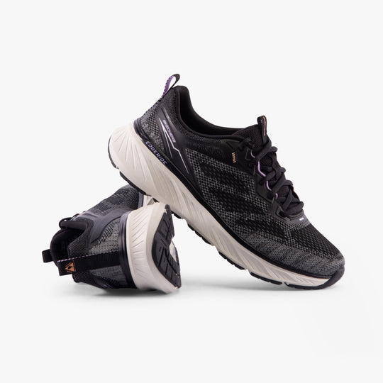 Skechers 150471/BKLV EDGERIDE-POWER FLOW Womens Trainers Black/Lavender side view with textured upper and flexible sole.