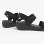 Skechers 163165/BBK ARYA - ON THE RISE Womens Sandals Black, side view showcasing wedge heel and slip-on design.