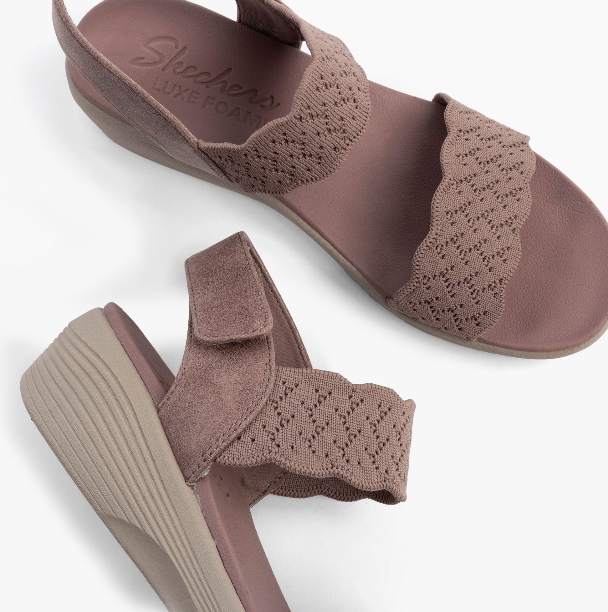 Skechers 163165/MVE ARYA - ON THE RISE Womens Sandals Mauve/Pink top view showcasing the wedge heel and textile details.