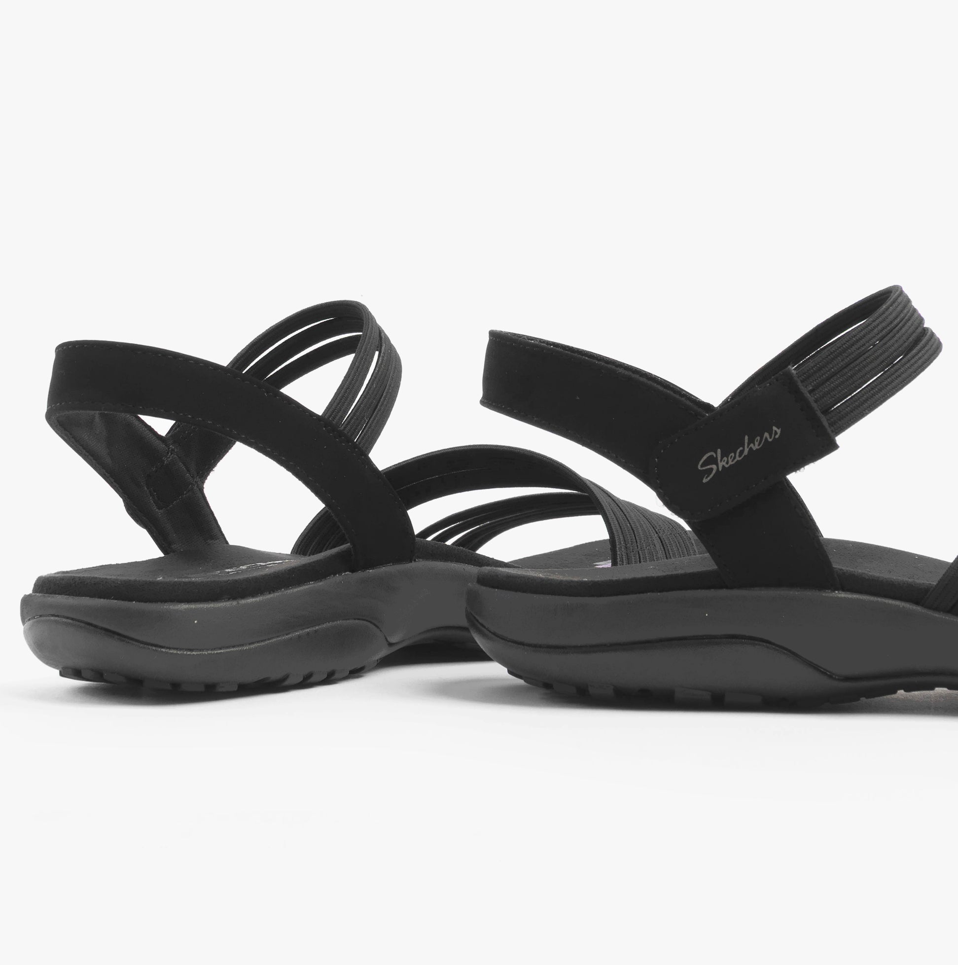 Skechers 163573/BBK REGGAE SLIM - COFFEE RUN Womens Sandals Black side view showcasing the comfortable straps and low heel.