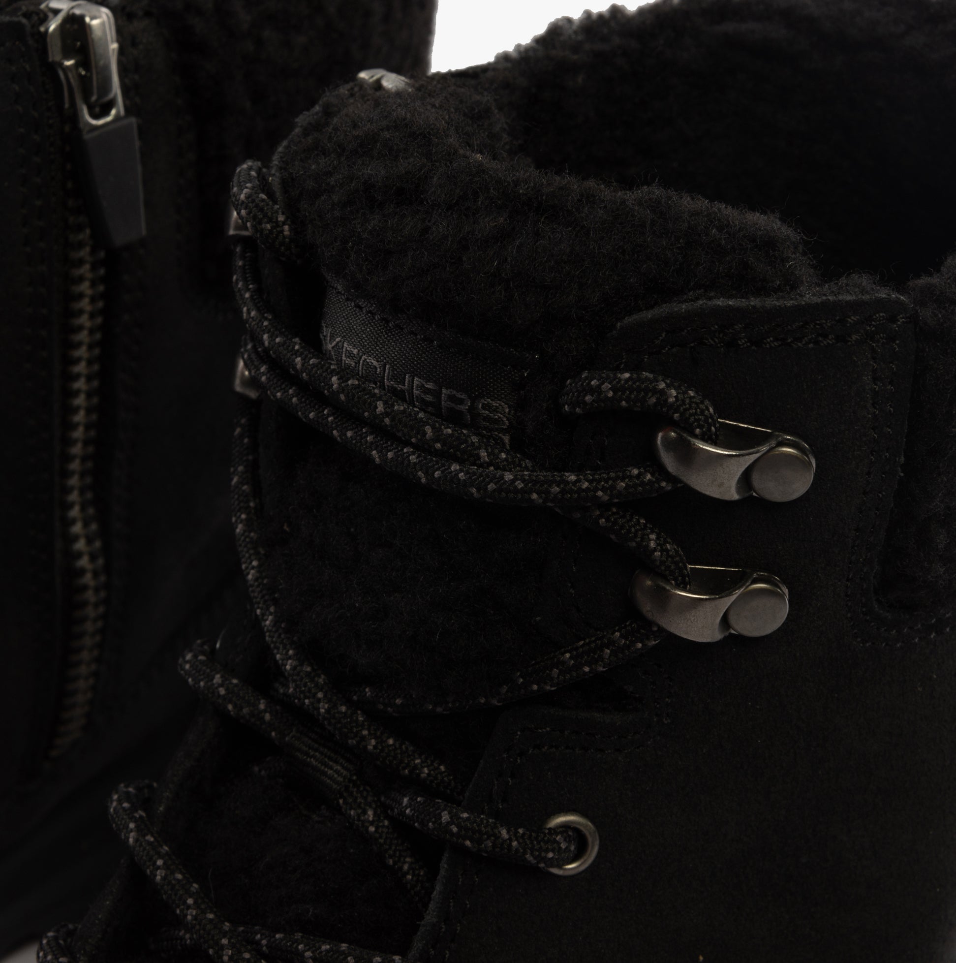 Skechers 16677/BBK GLACIAL ULTRA - WOODLANDS Womens Boots Black detail view showing lace and warm lining.