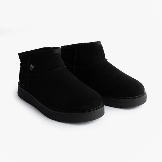 Skechers 167848/BBK KEEPSAKES COZY - COZY MINI Womens Boots Black side view showcasing soft suede upper and comfortable design.