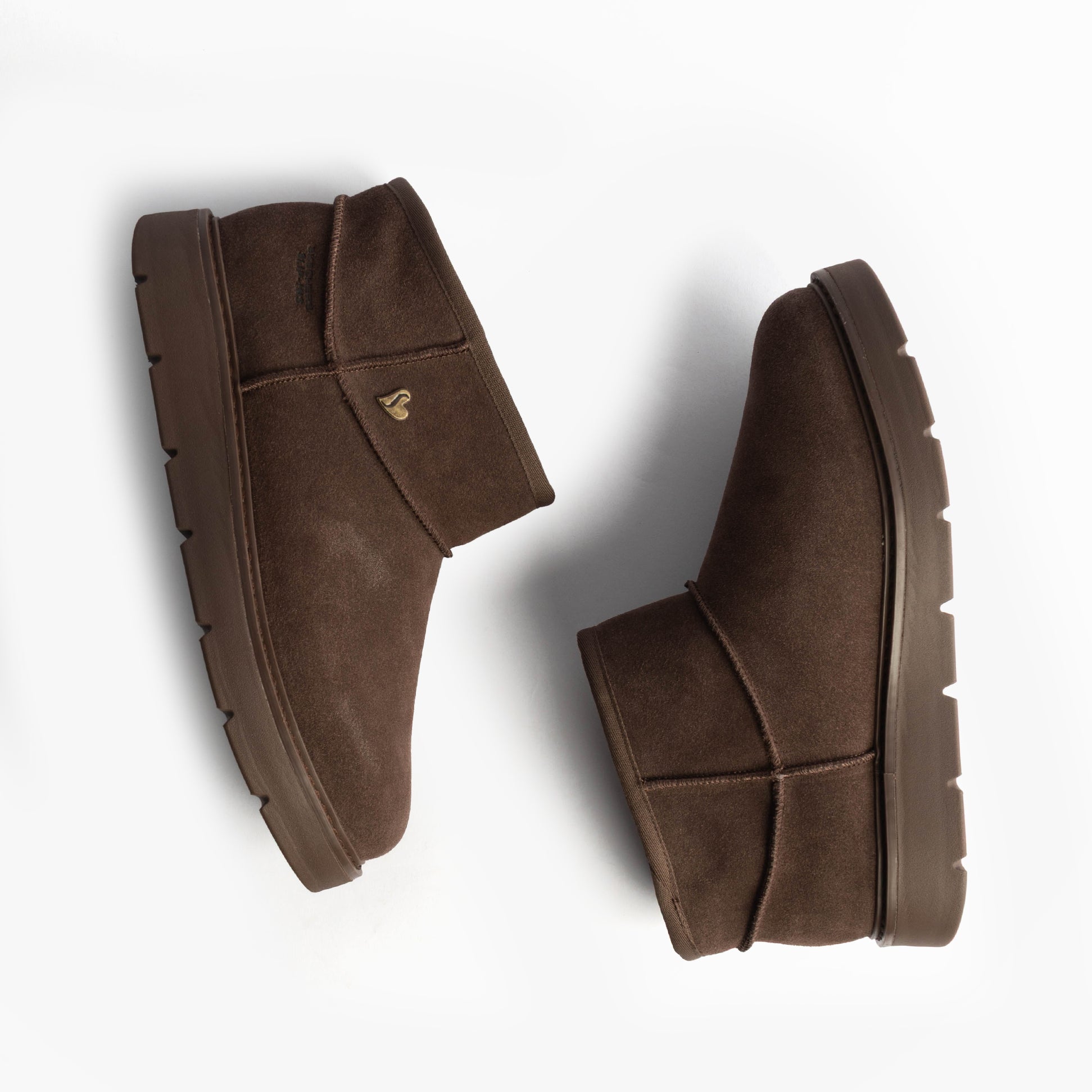 Skechers 167848/CHOC KEEPSAKES COZY - COZY MINI Womens Boots Chocolate side view showcasing brown suede upper and rubber sole.