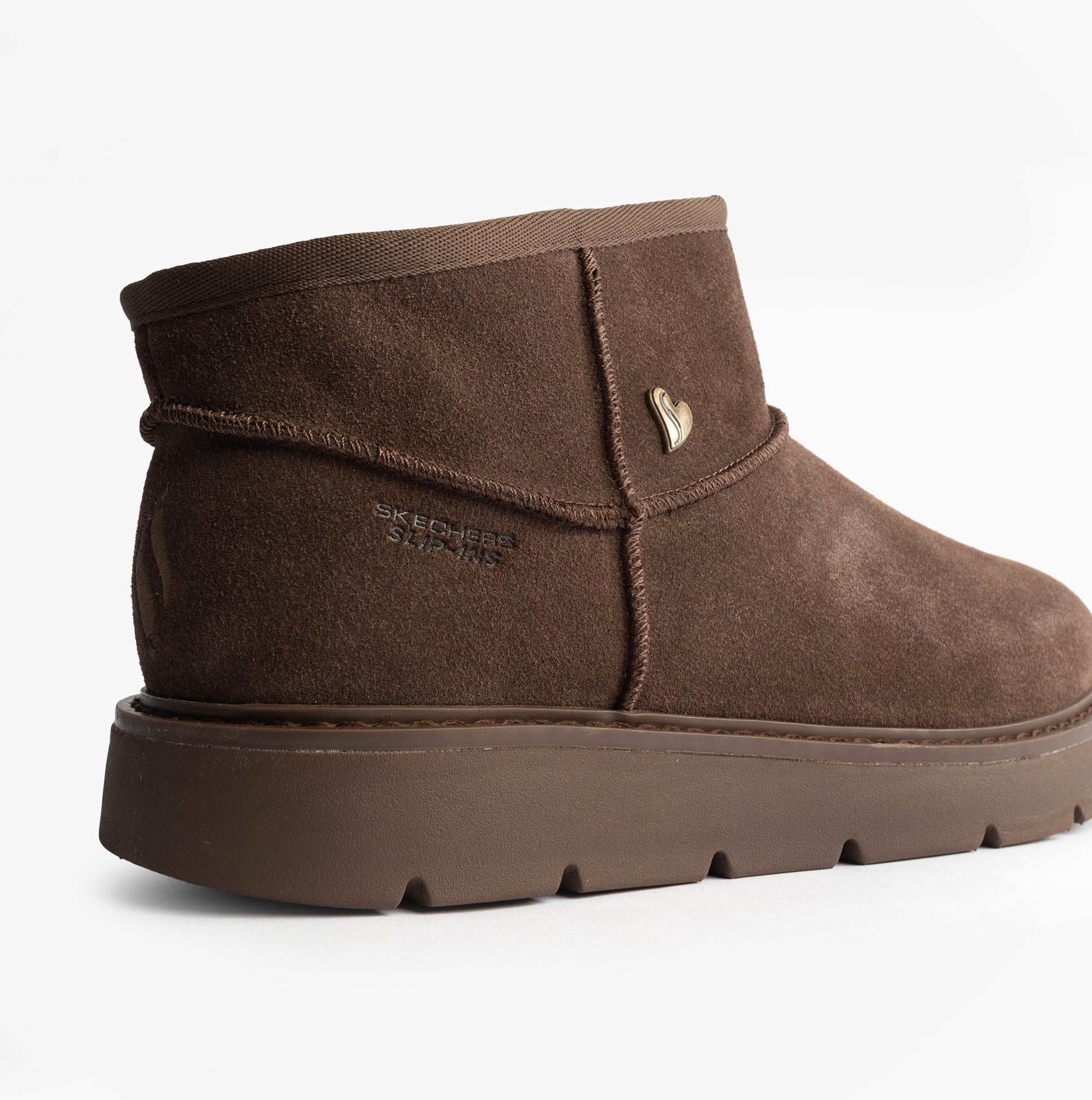 Skechers 167848/CHOC KEEPSAKES COZY - COZY MINI Womens Boots Chocolate side view, showing shearling upper and round toe.