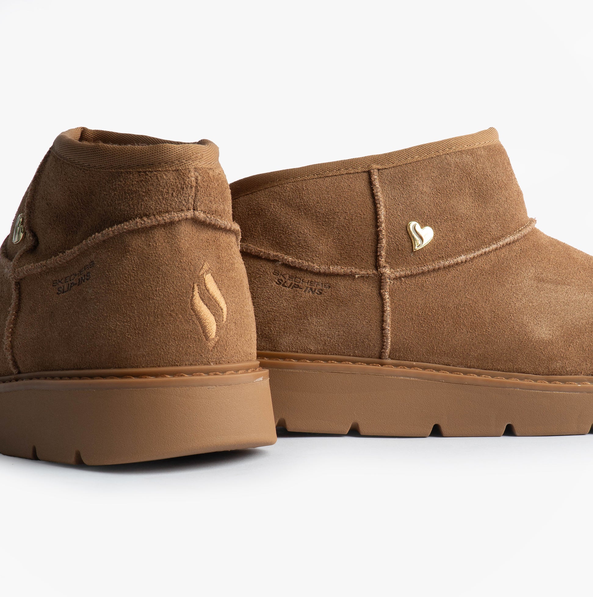 Skechers 167848/CSNT KEEPSAKES COZY - COZY MINI Womens Boots Chestnut side view showing soft suede upper and rubber sole.