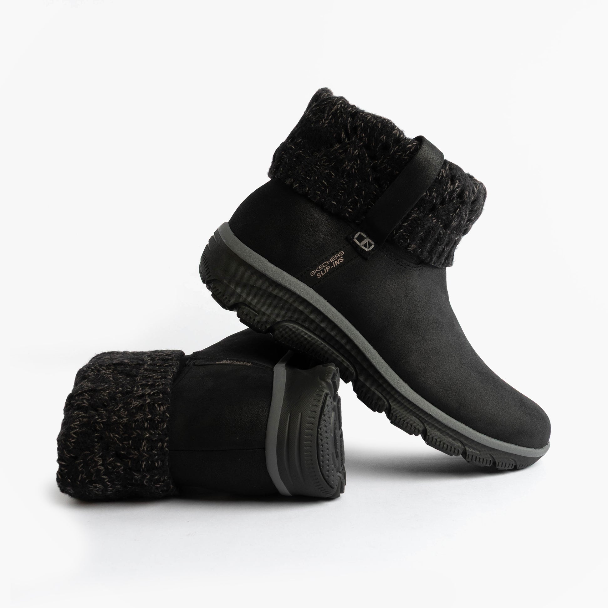 Skechers 168033/BLK EASY GOING - COZY WEATHER 2 Womens Boots Black side view, showcasing vegan leather and textured cuff.