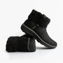 Skechers 168033/BLK EASY GOING - COZY WEATHER 2 Womens Boots Black side view, showcasing vegan leather and textured cuff.