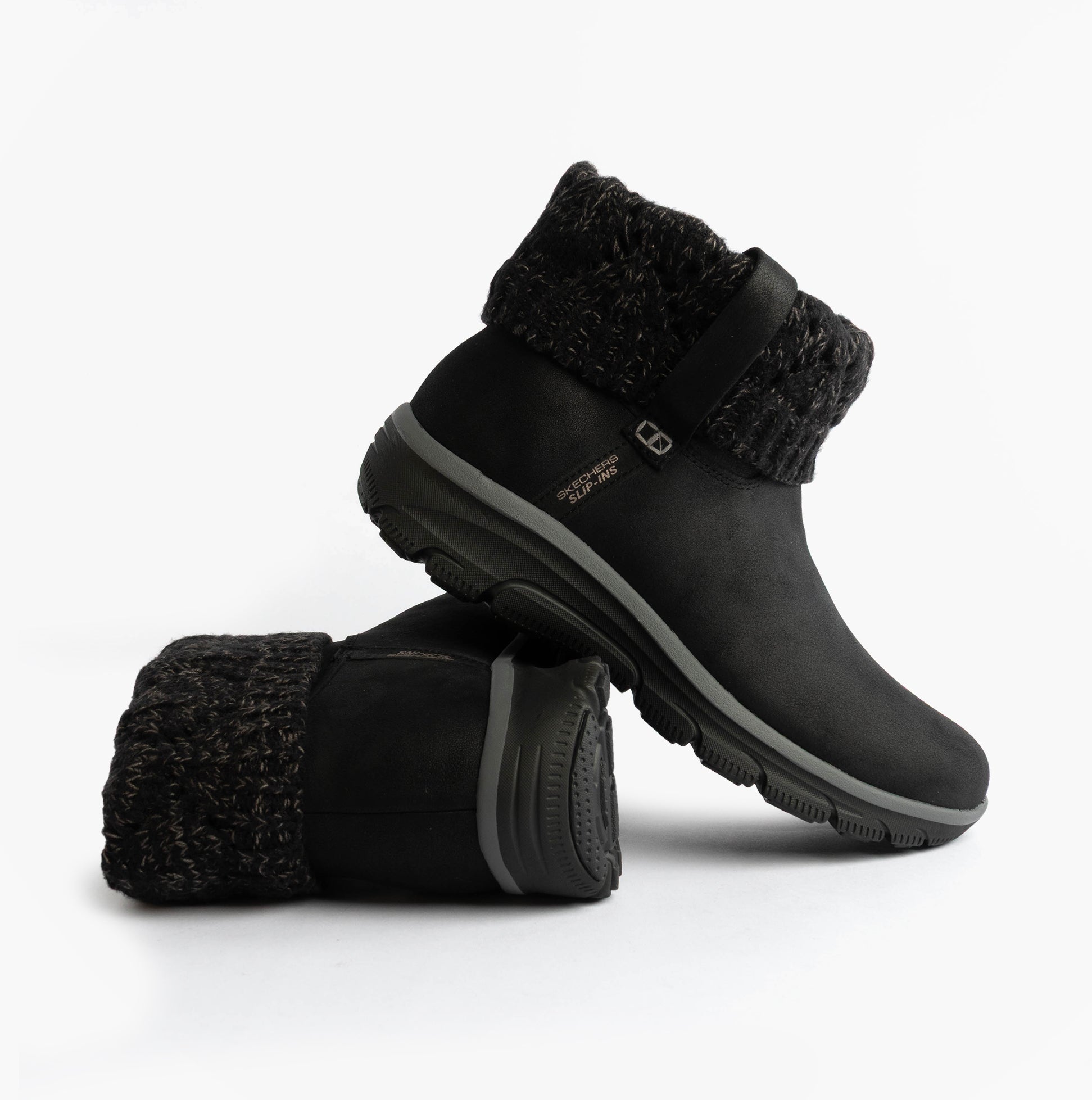Skechers 168033/BLK EASY GOING - COZY WEATHER 2 Womens Boots Black side view, showcasing vegan leather and textured cuff.
