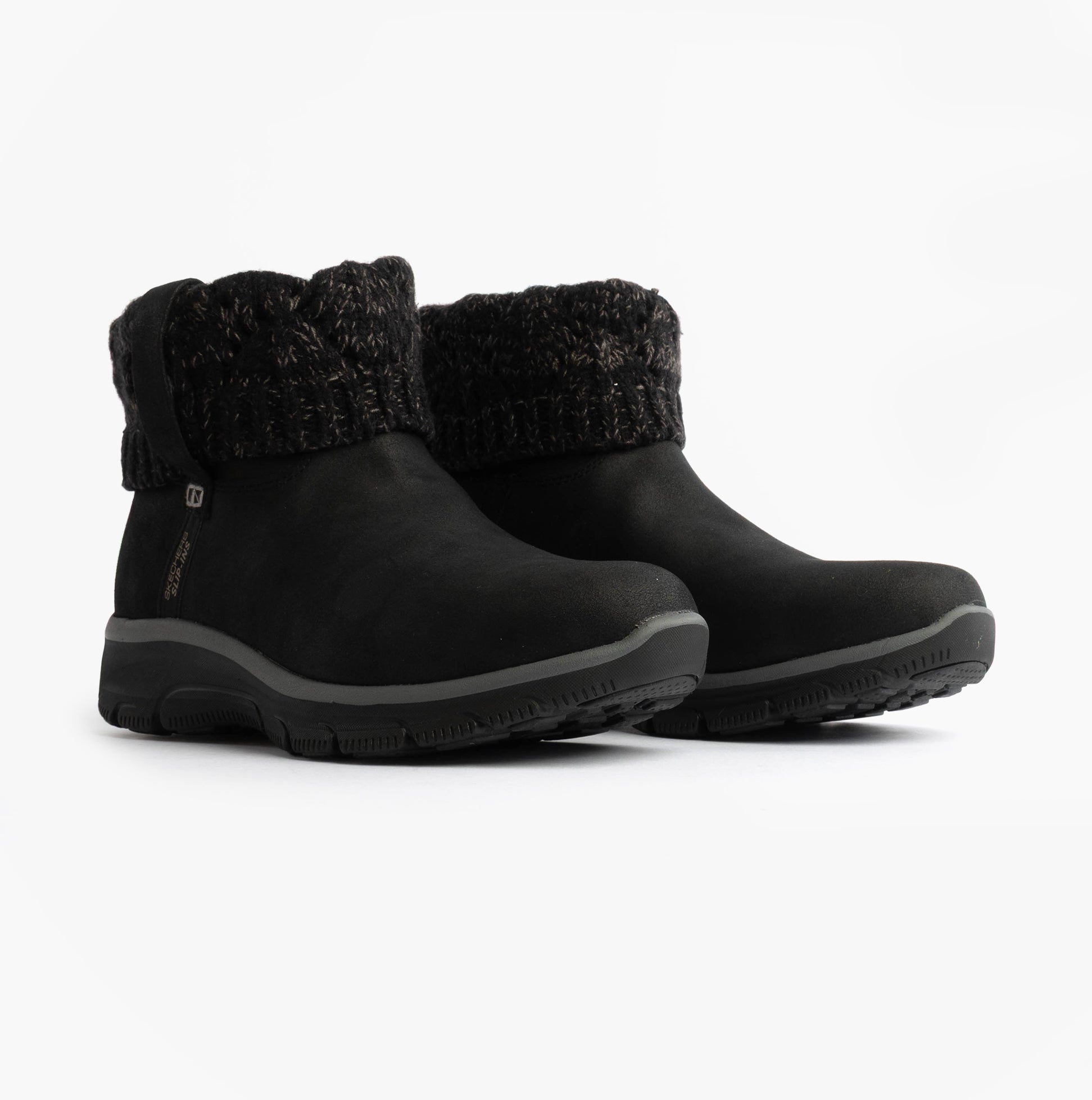 Skechers 168033/BLK EASY GOING - COZY WEATHER 2 Womens Boots Black side view showcasing vegan leather and cozy knit cuff.