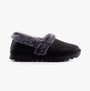 Skechers 169027/BLK COZY UP Womens Slippers Black side view featuring soft fur lining and slip-on design.