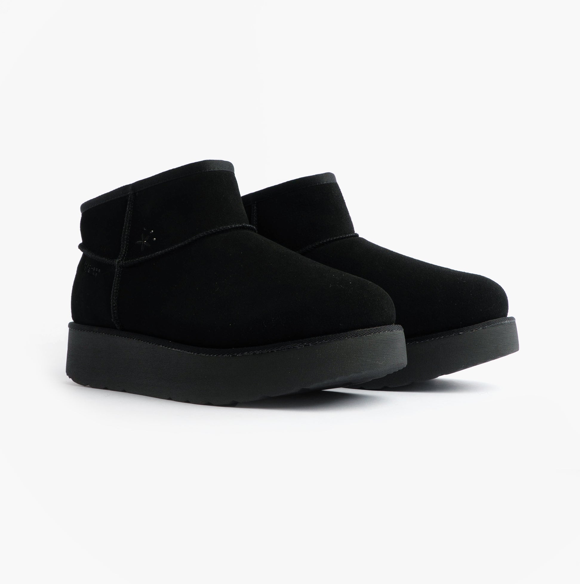 Skechers 169143/BBK KEEP COZY Womens Boots Black side view showing suede leather upper and rubber sole.