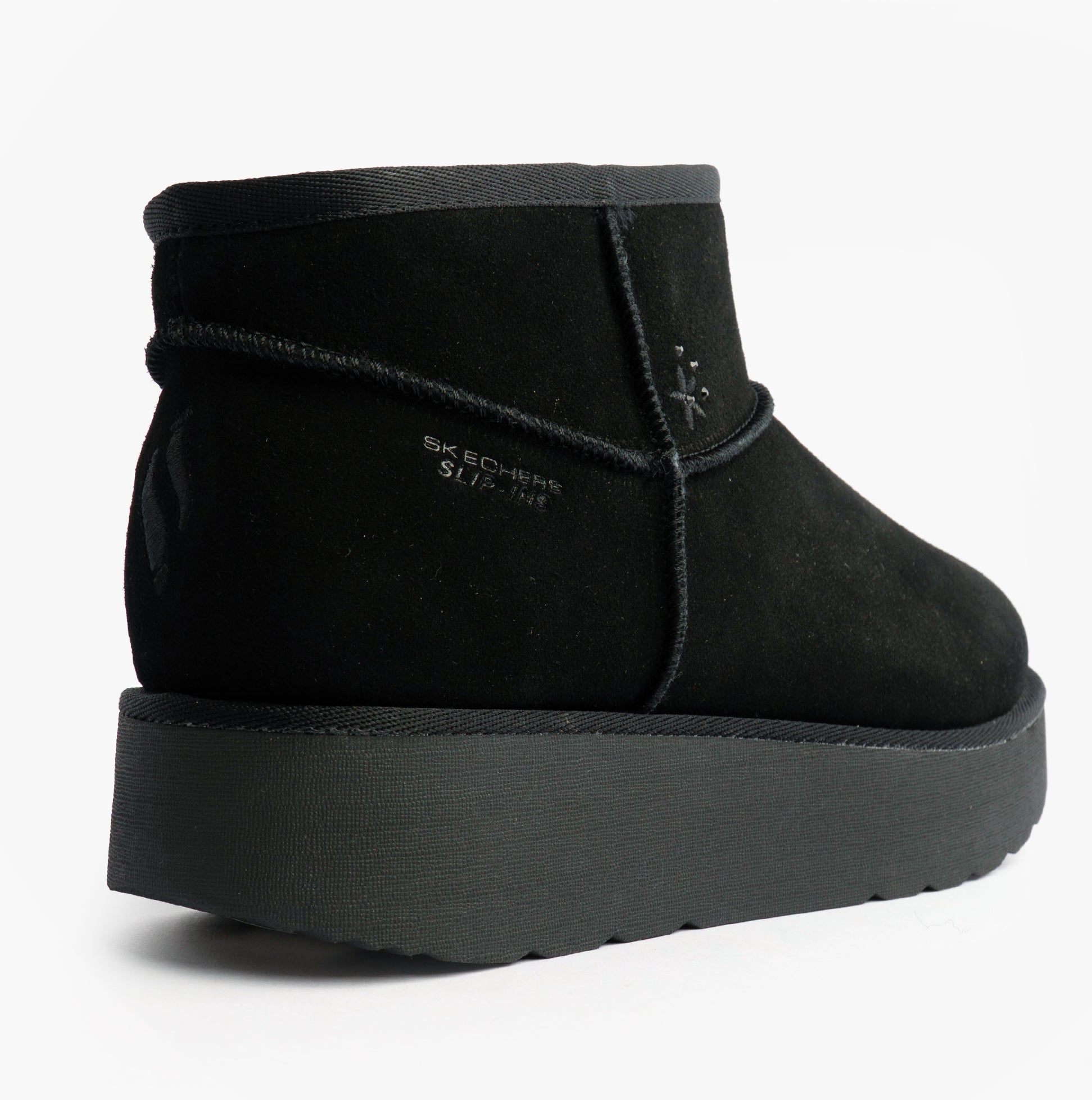 Skechers 169143/BBK KEEP COZY Womens Boots Black side view showcasing suede leather and rubber sole.