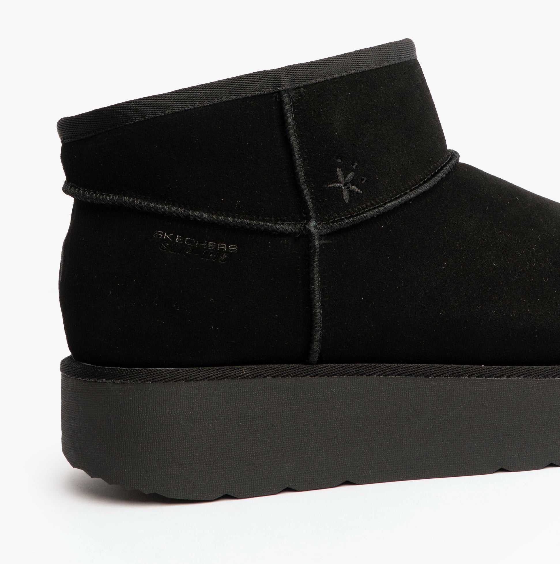 Skechers 169143/BBK KEEP COZY Womens Boots Black side view showcasing suede leather upper and low heel.