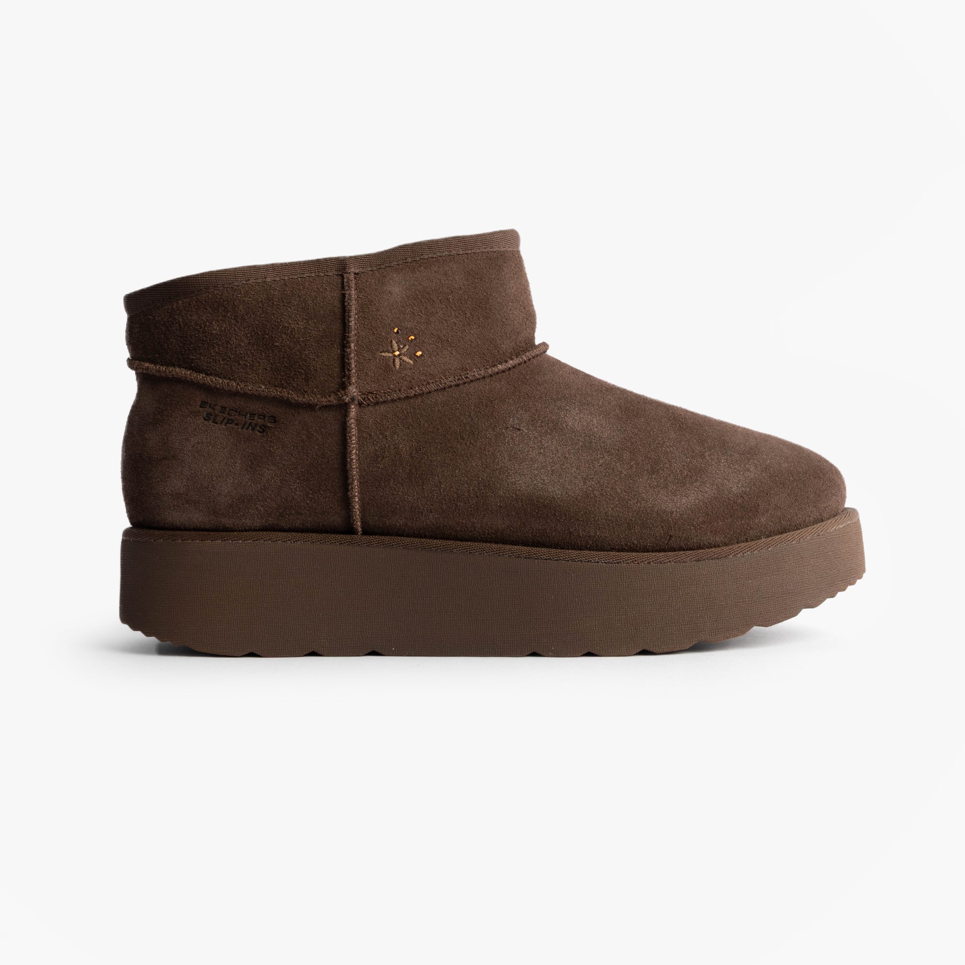Skechers 169143/CHOC KEEP COZY Womens Boots Chocolate side view showcasing faux leather and comfortable design.