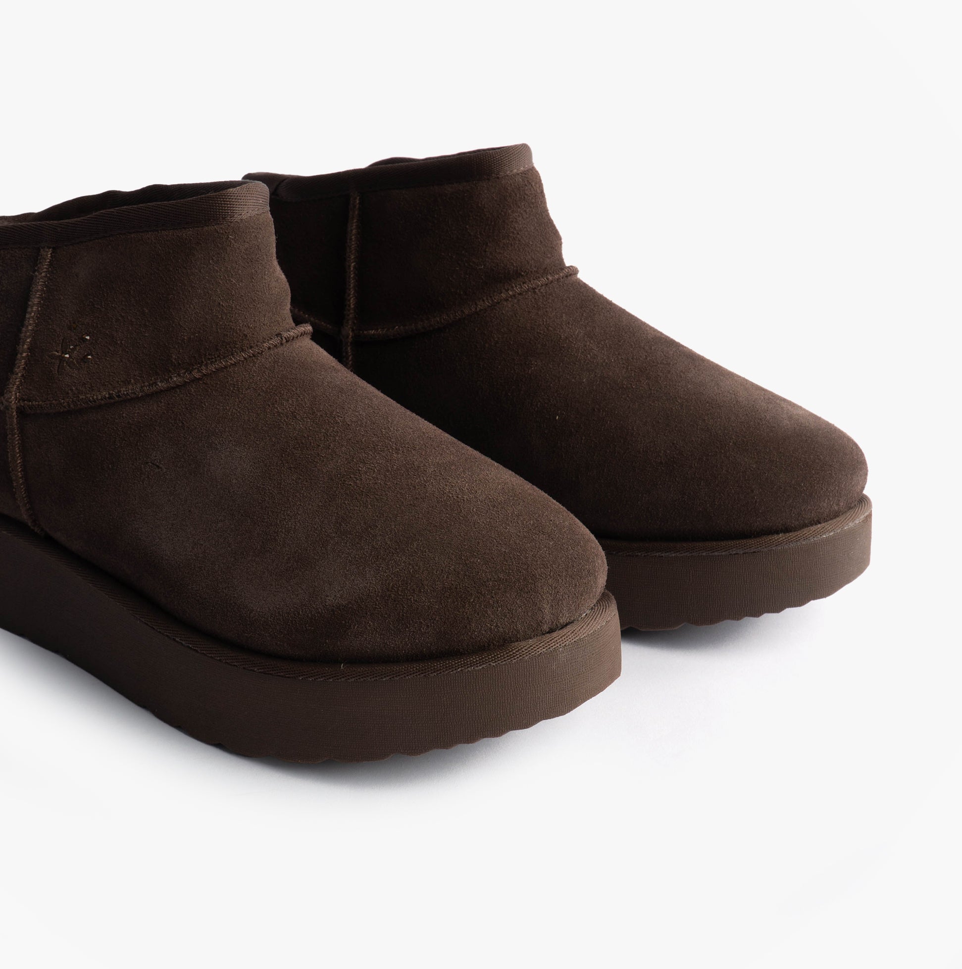 Skechers 169143/CHOC KEEP COZY Womens Boots Chocolate side view showing soft faux leather and comfortable design.