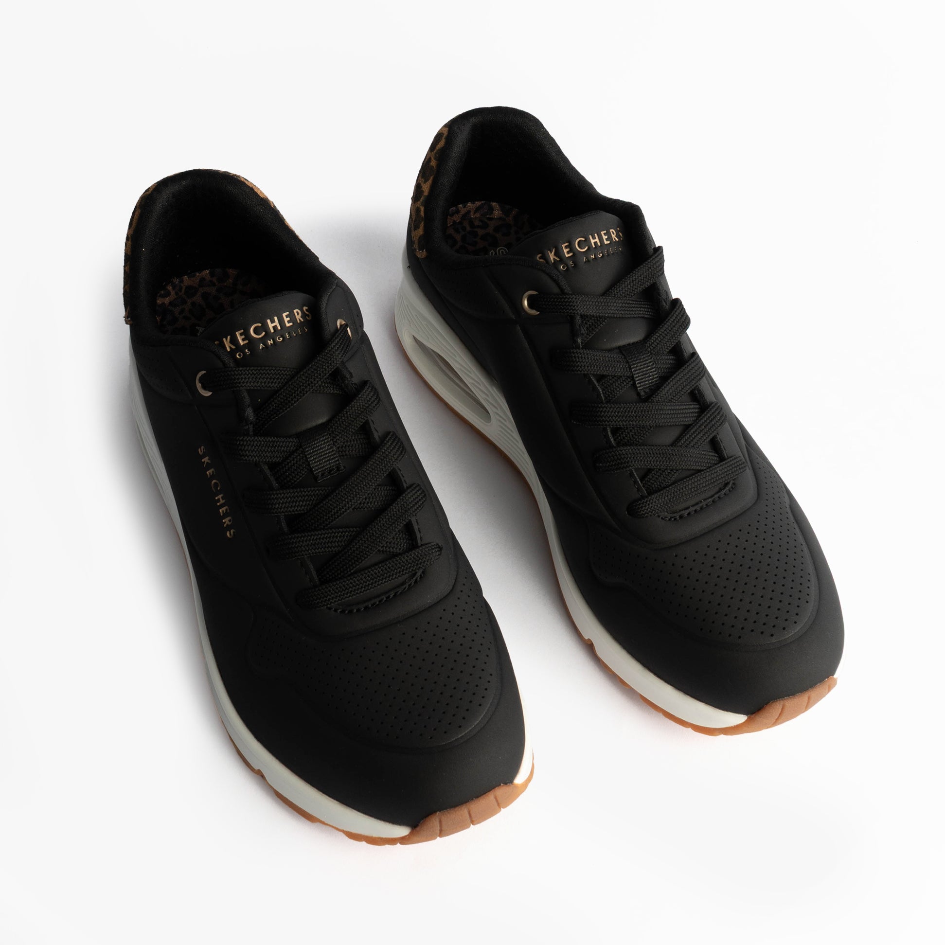 Skechers 177093/BKLD UNO-JUNGLE NITE Womens Trainers Black Durabuck/Leopard Printed top view, showing black leather and leopard print details.