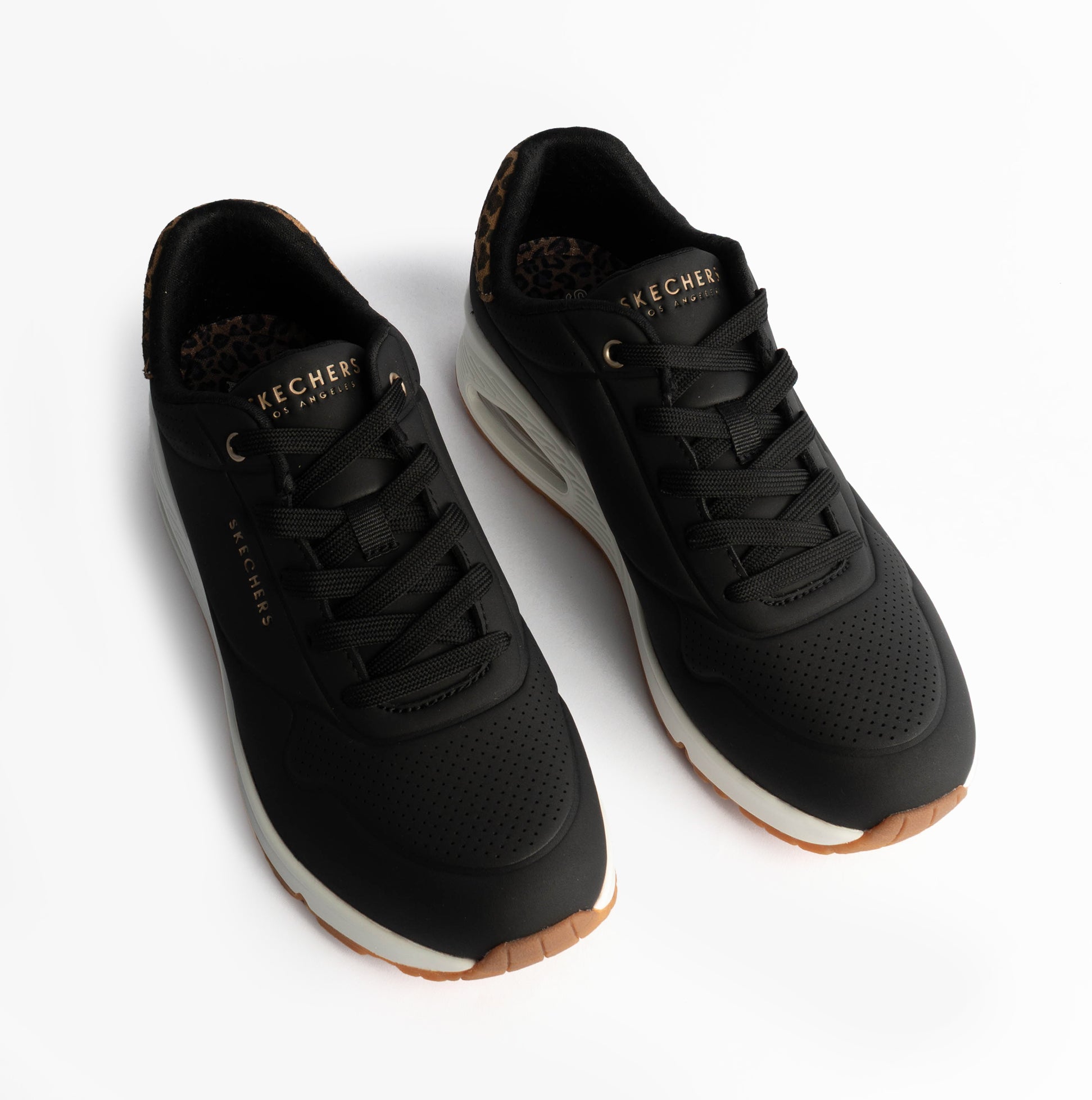 Skechers 177093/BKLD UNO-JUNGLE NITE Womens Trainers Black Durabuck/Leopard Printed top view, showing black leather and leopard print details.