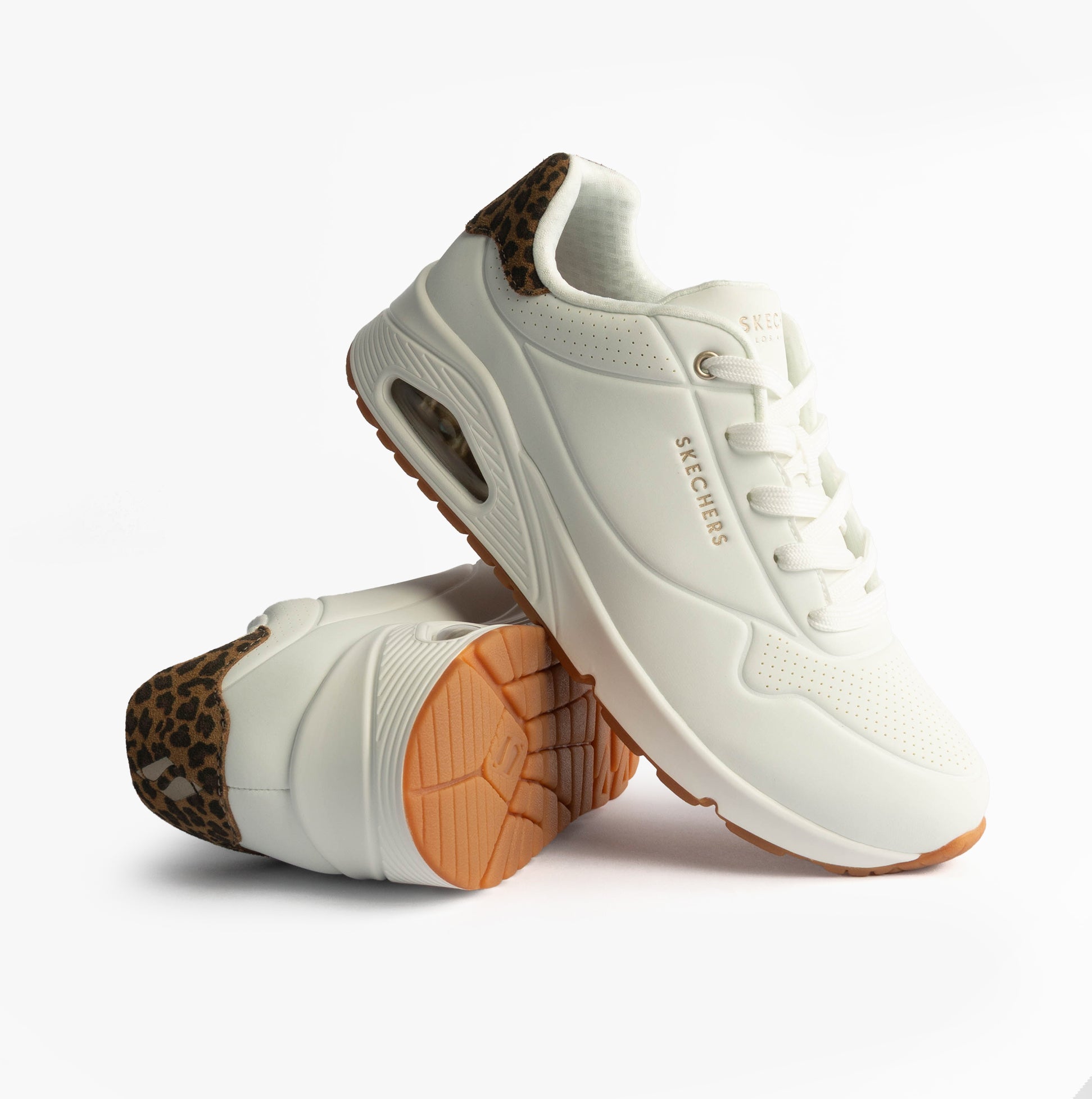 Skechers 177093/WHLD UNO-JUNGLE NITE Womens Trainers White Durabuck/Leopard Printed side view with lace-up closure.