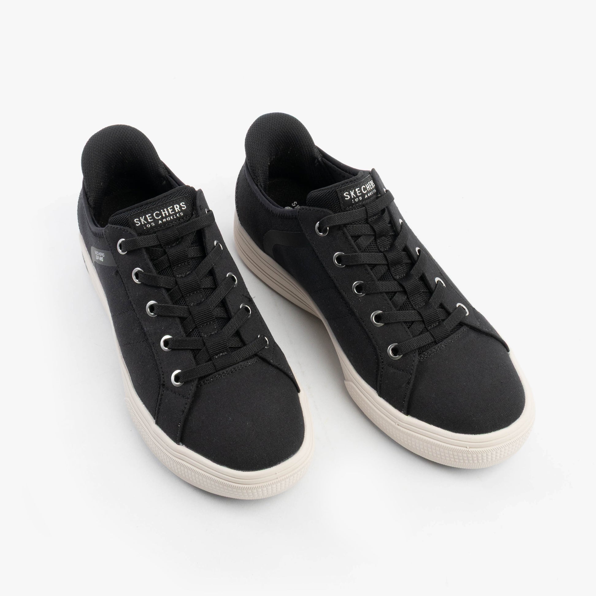 Skechers 177205/BLK ARCH FIT ARCADE-FOREVER COZY Womens Trainers Black, top view showcasing lace-up design and canvas upper.