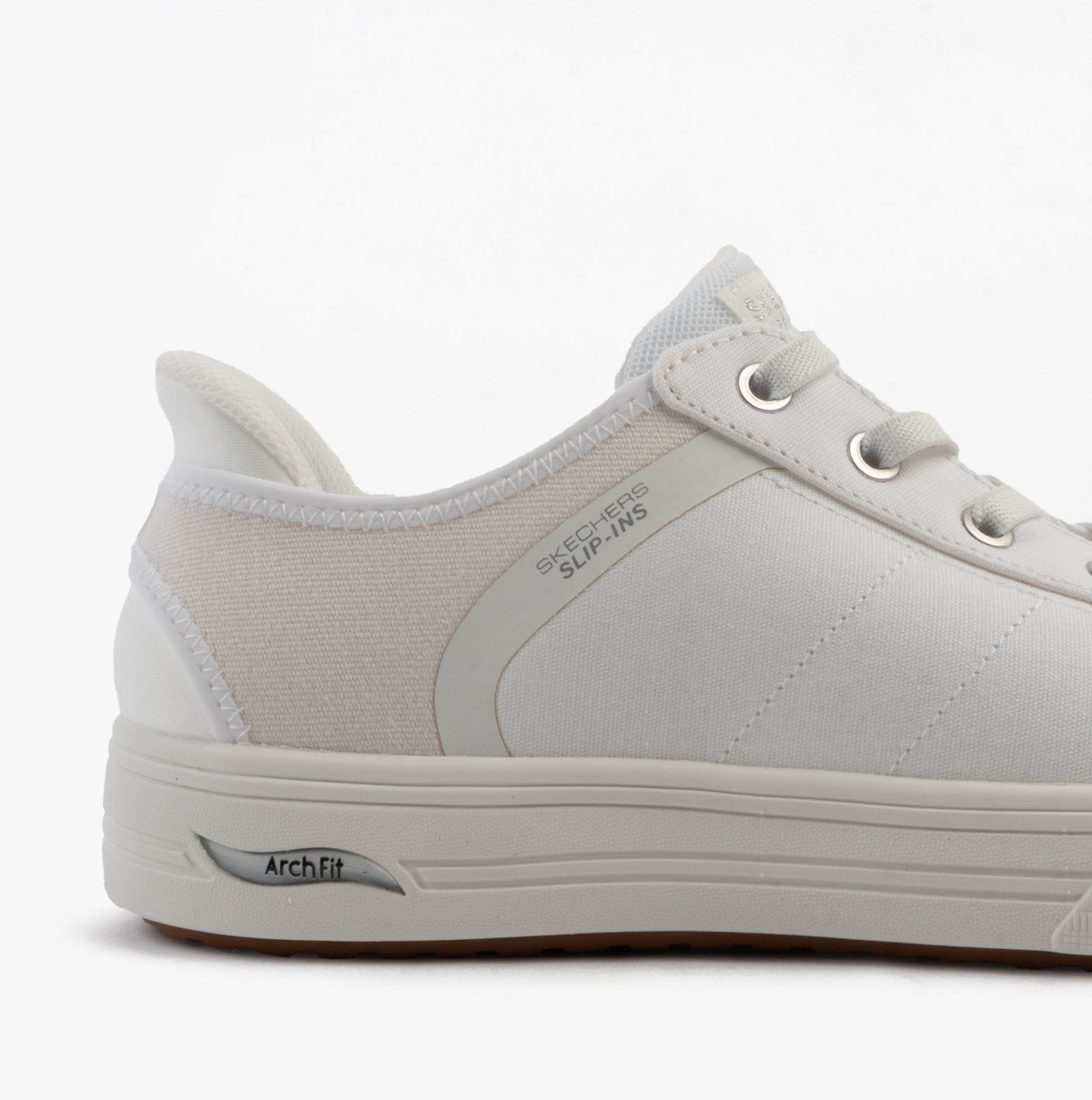 Skechers 177205/WHT ARCH FIT ARCADE-FOREVER COZY Womens Trainers White side view showcasing comfortable canvas design.