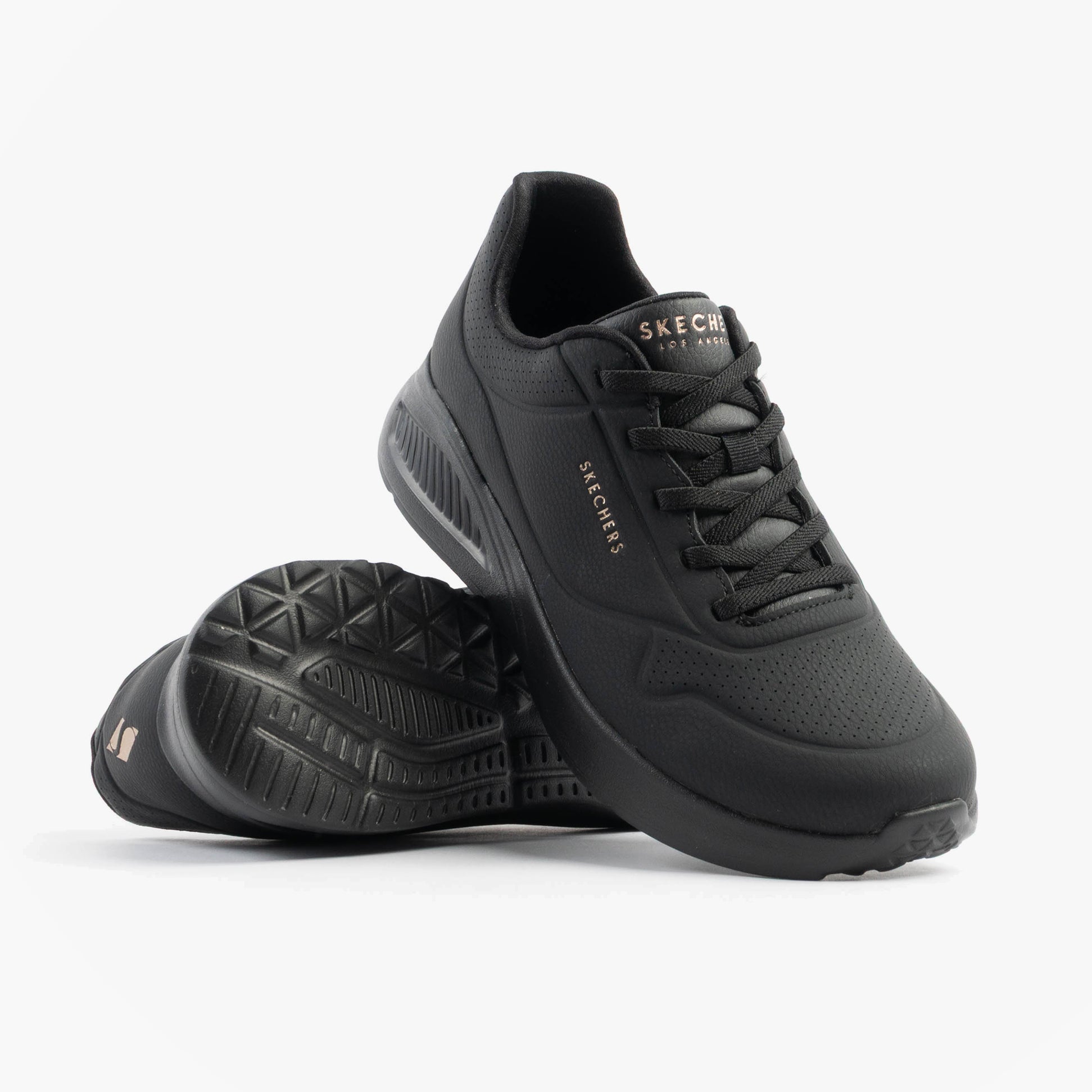 Skechers 177289/BBK UNO LITE - LITE WORK Womens Trainers Black side view showing synthetic leather and rubber sole.