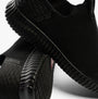 Side view of Skechers Work 200171EC CESSNOCK RYLIND SR Mens Occupational Trainers Black, featuring slip resistant sole and textile upper.