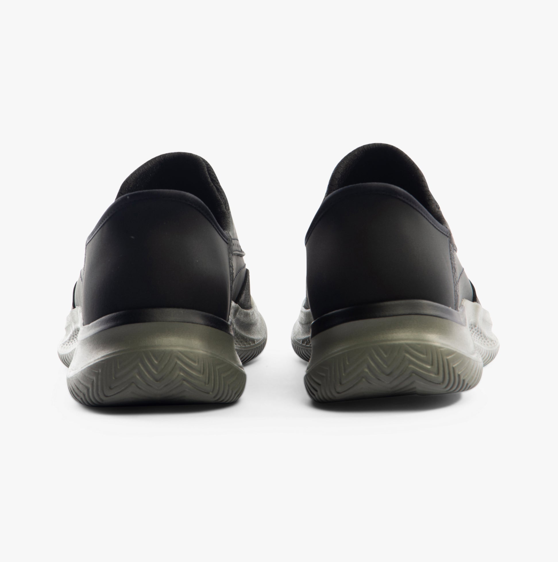 Skechers 205211/BLK HASTING - RORY Mens Shoes Black back view showcasing leather upper and rubber sole.
