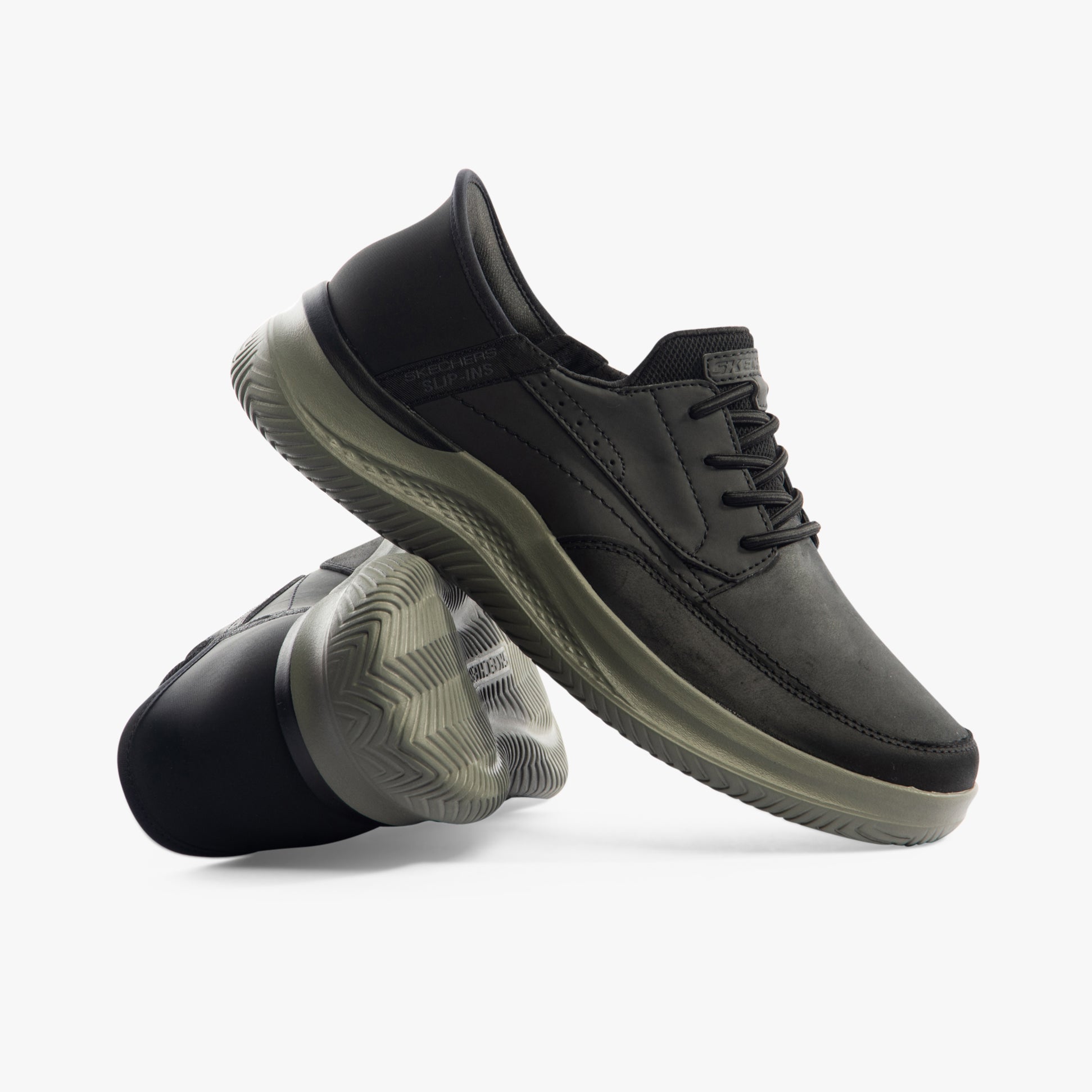 Skechers 205211/BLK HASTING - RORY Mens Shoes Black side view showcasing leather upper and rubber sole.