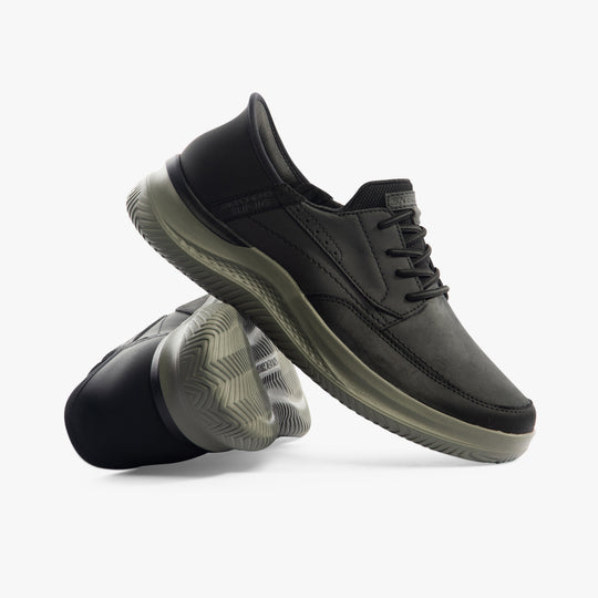 Skechers 205211/BLK HASTING - RORY Mens Shoes Black side view showcasing leather upper and rubber sole.