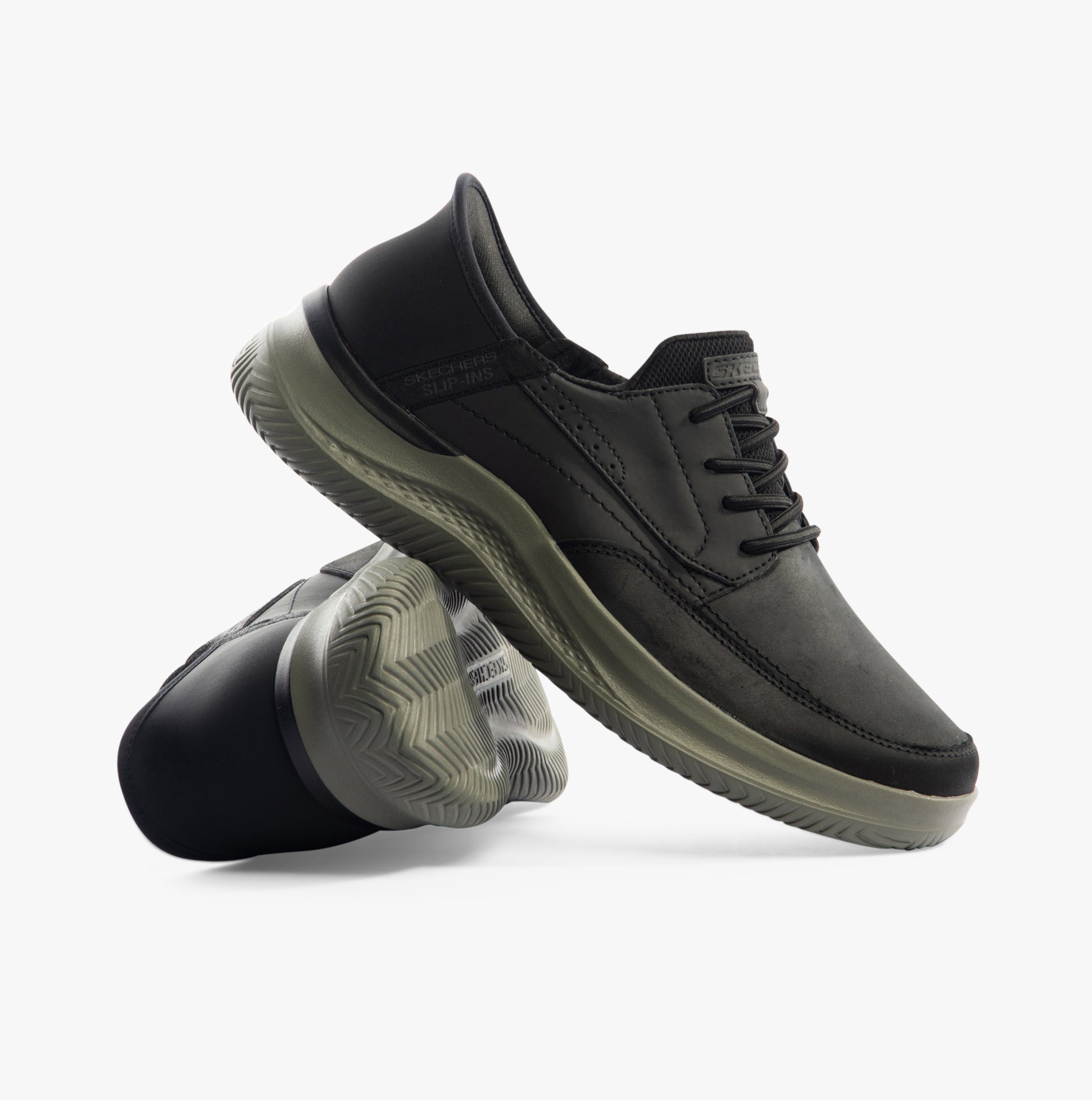 Skechers 205211/BLK HASTING - RORY Mens Shoes Black side view showcasing leather upper and rubber sole.