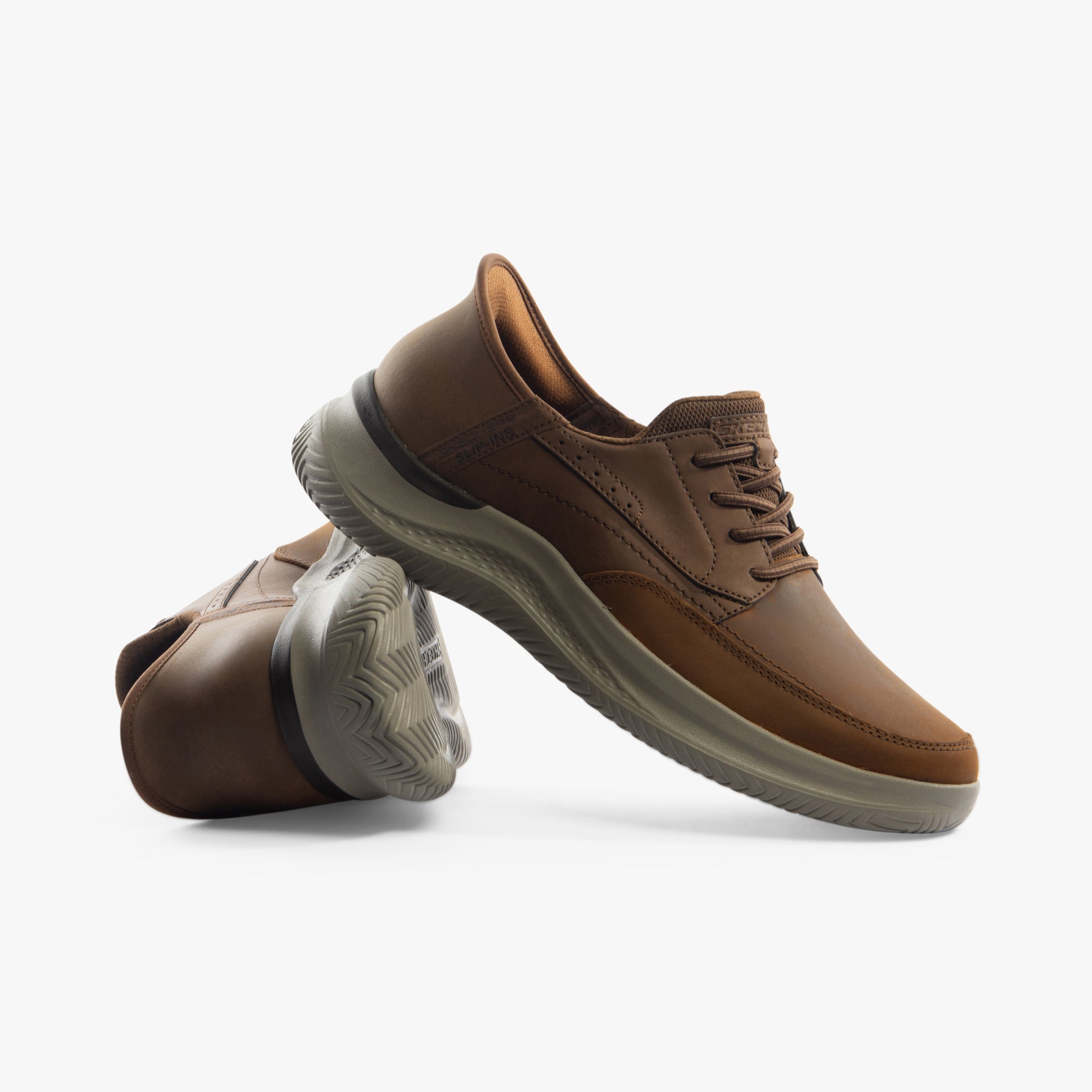 Skechers 205211/CDB HASTING - RORY Mens Shoes Dark Brown side view and angled front view with detailing.