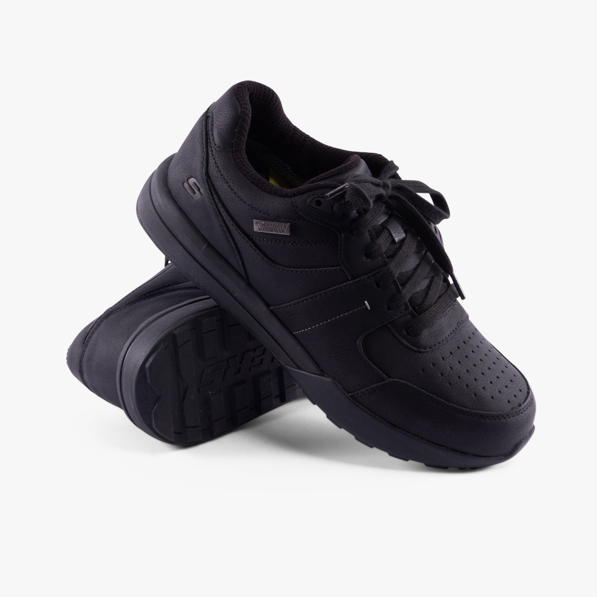 Skechers 205236/BBK NETSON - GANDER Mens Trainers Black side view showcasing lace-up closure and round toe design.