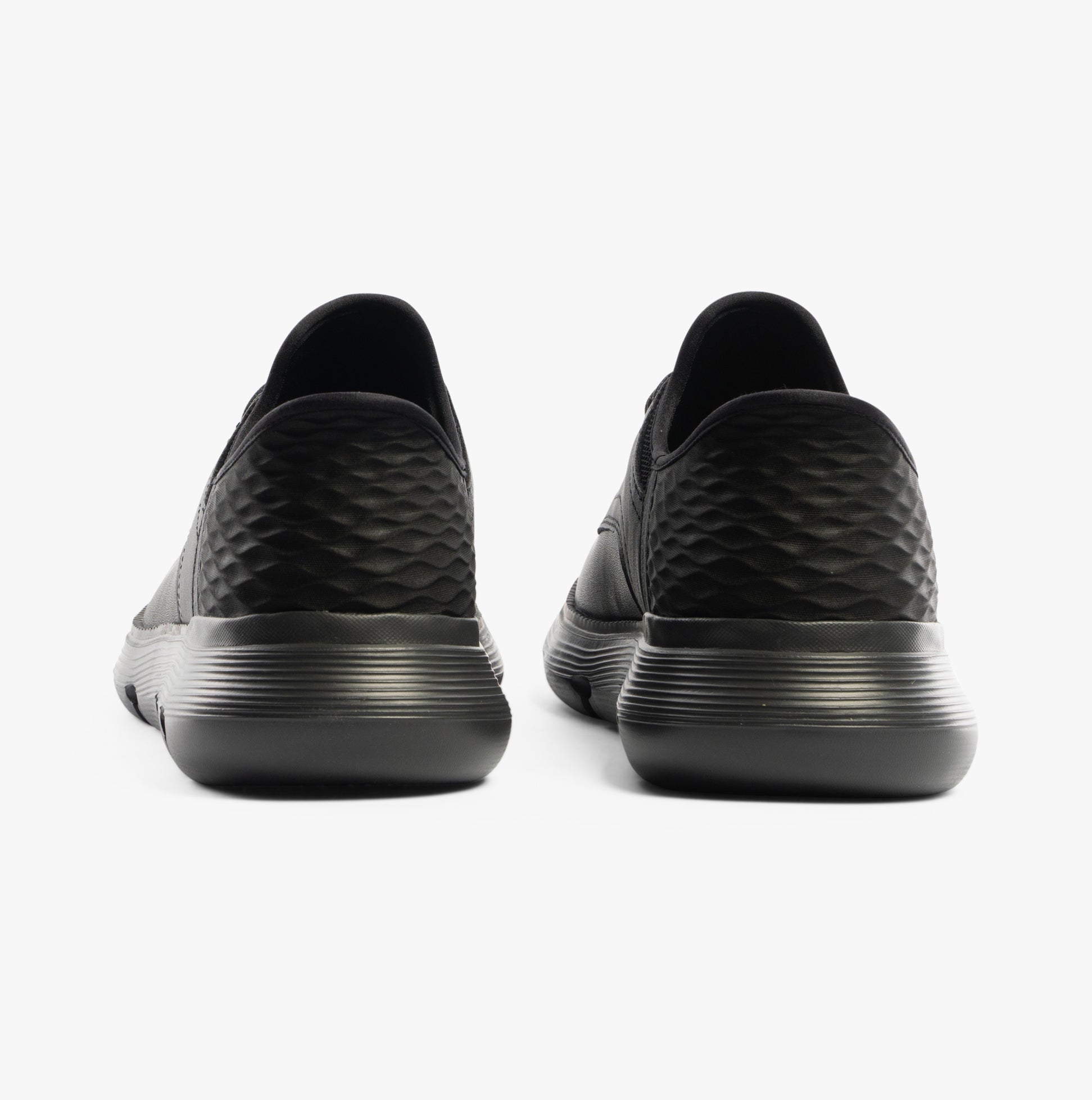 Skechers 205278/BBK GARZA - CARLYN Mens Shoes Black rear view showcasing the stylish design and cushioned sole.