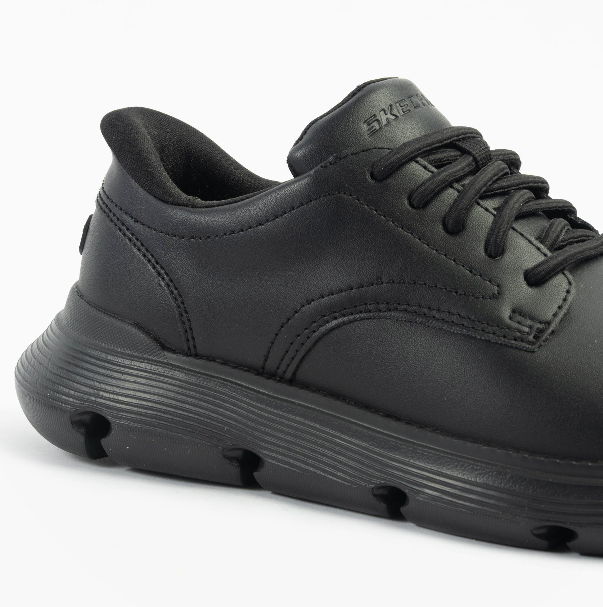 Skechers 205353/BBK GARZA - DURAN Mens Shoes Black side view showing smooth leather upper and low-top design.