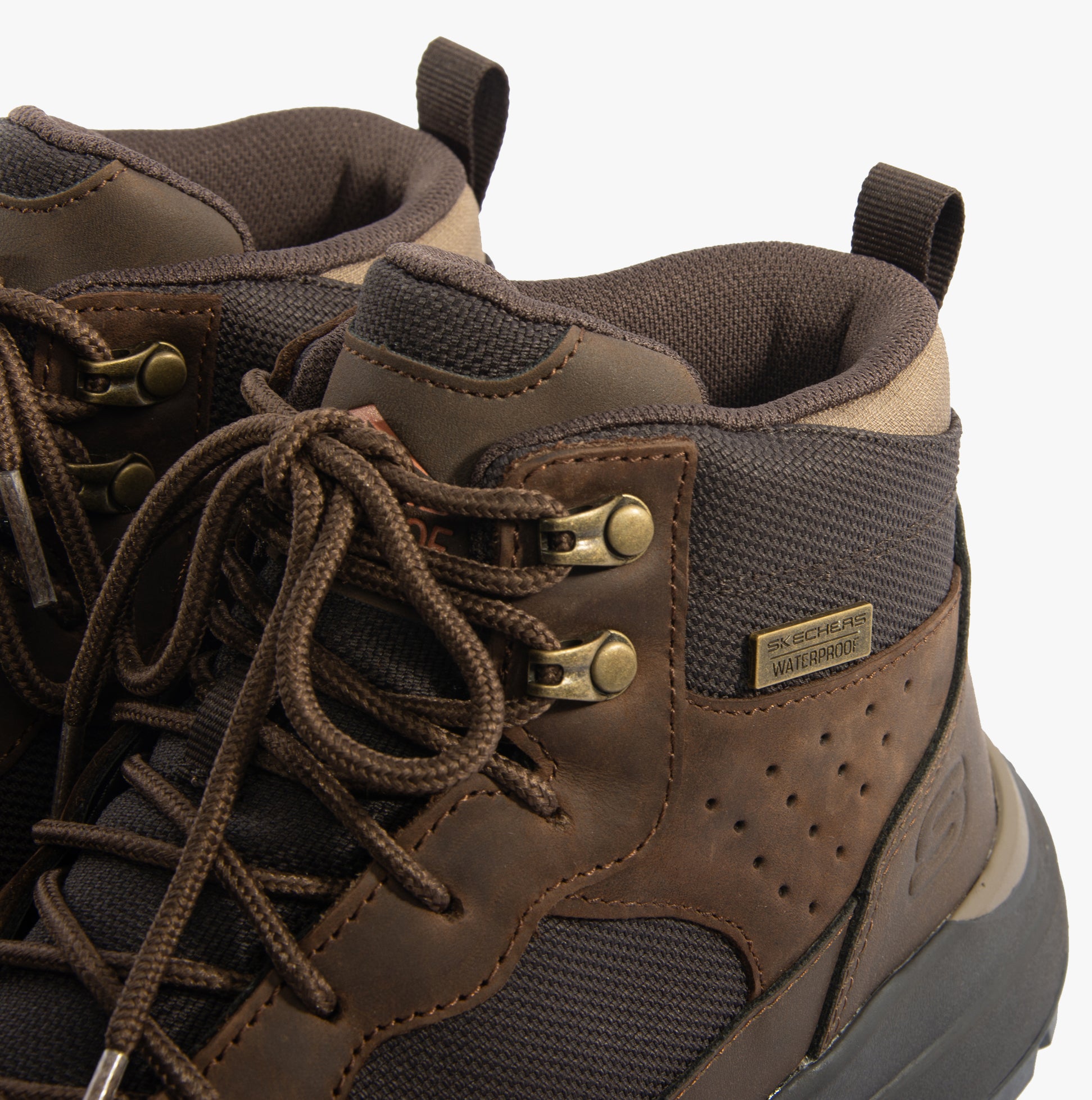 Skechers 210932/COC CAMBERT - HARLAN Mens Boots Cocoa close-up view highlighting lace-up detail and waterproof features.