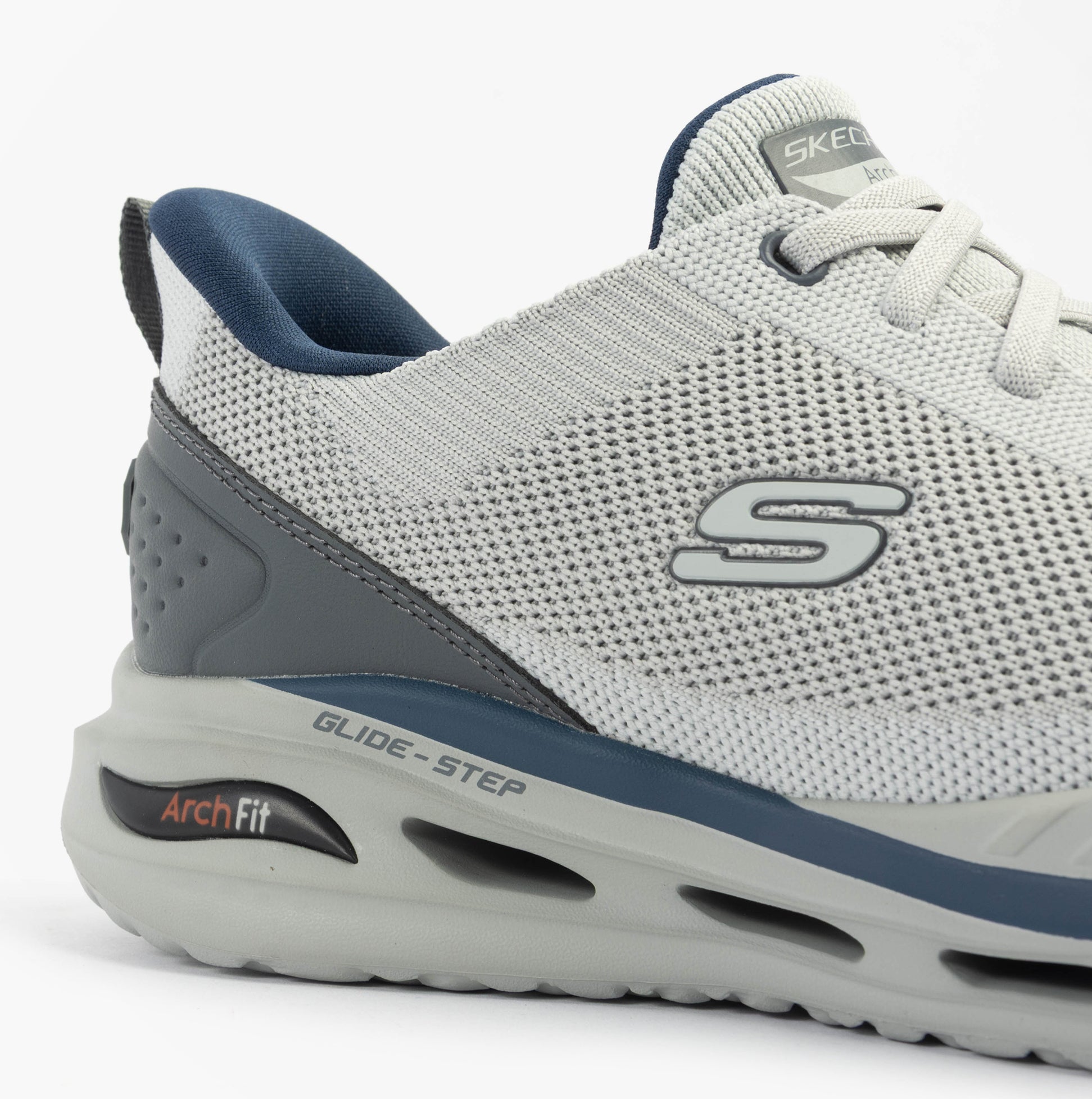 Skechers 210994/LTGY ARCH FIT ORVAN - KINCADE Mens Trainers Light Grey side view showcasing synthetic leather and Arch Fit features.