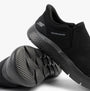 Skechers 216333/BBK GO WALK FLEX - OJAI Mens Trainers Black side view showing mesh upper and flexible sole.