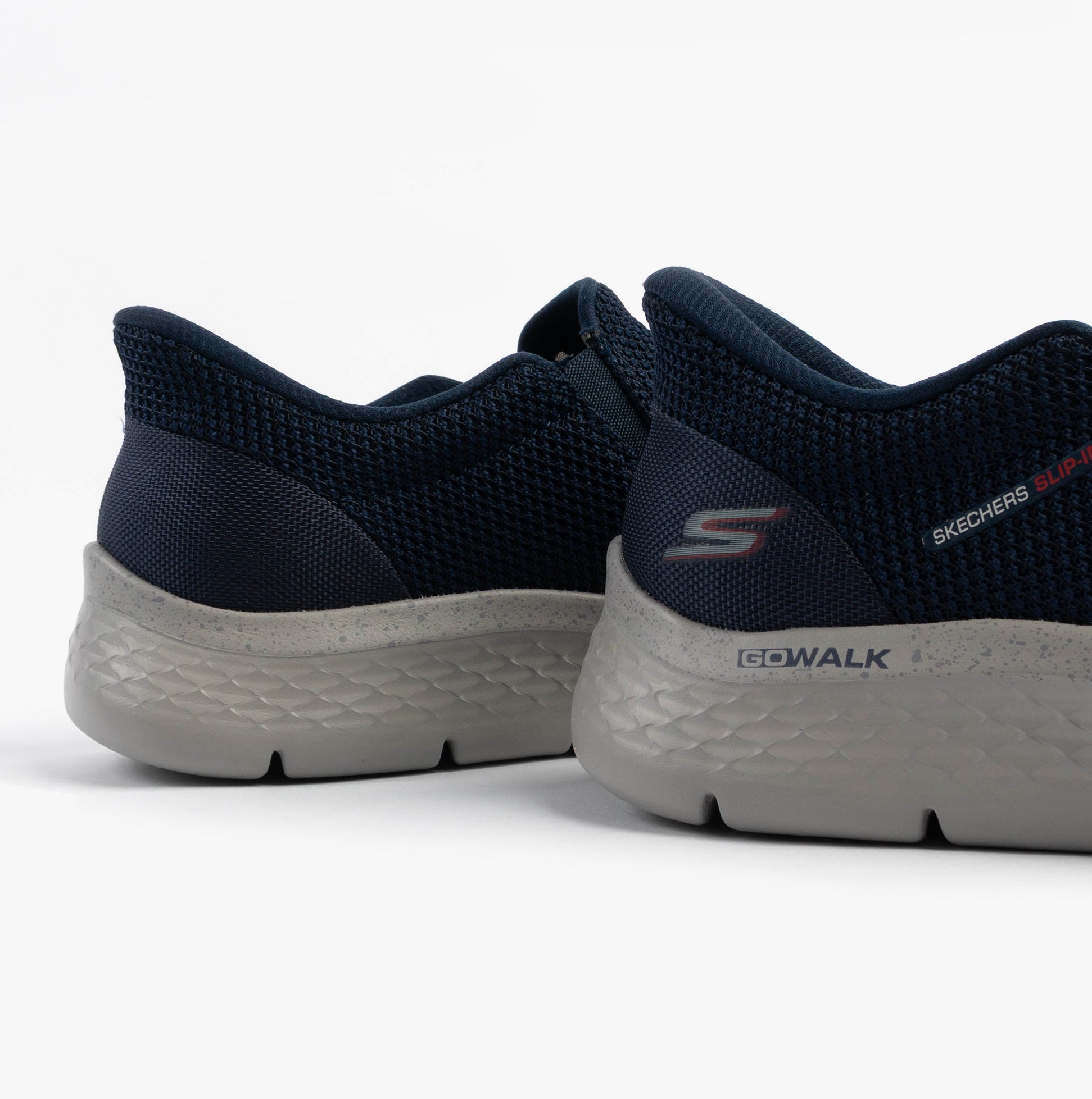 Skechers 216333/NVY GO WALK FLEX - OJAI Mens Trainers Navy rear view showing breathable mesh upper and rubber sole.
