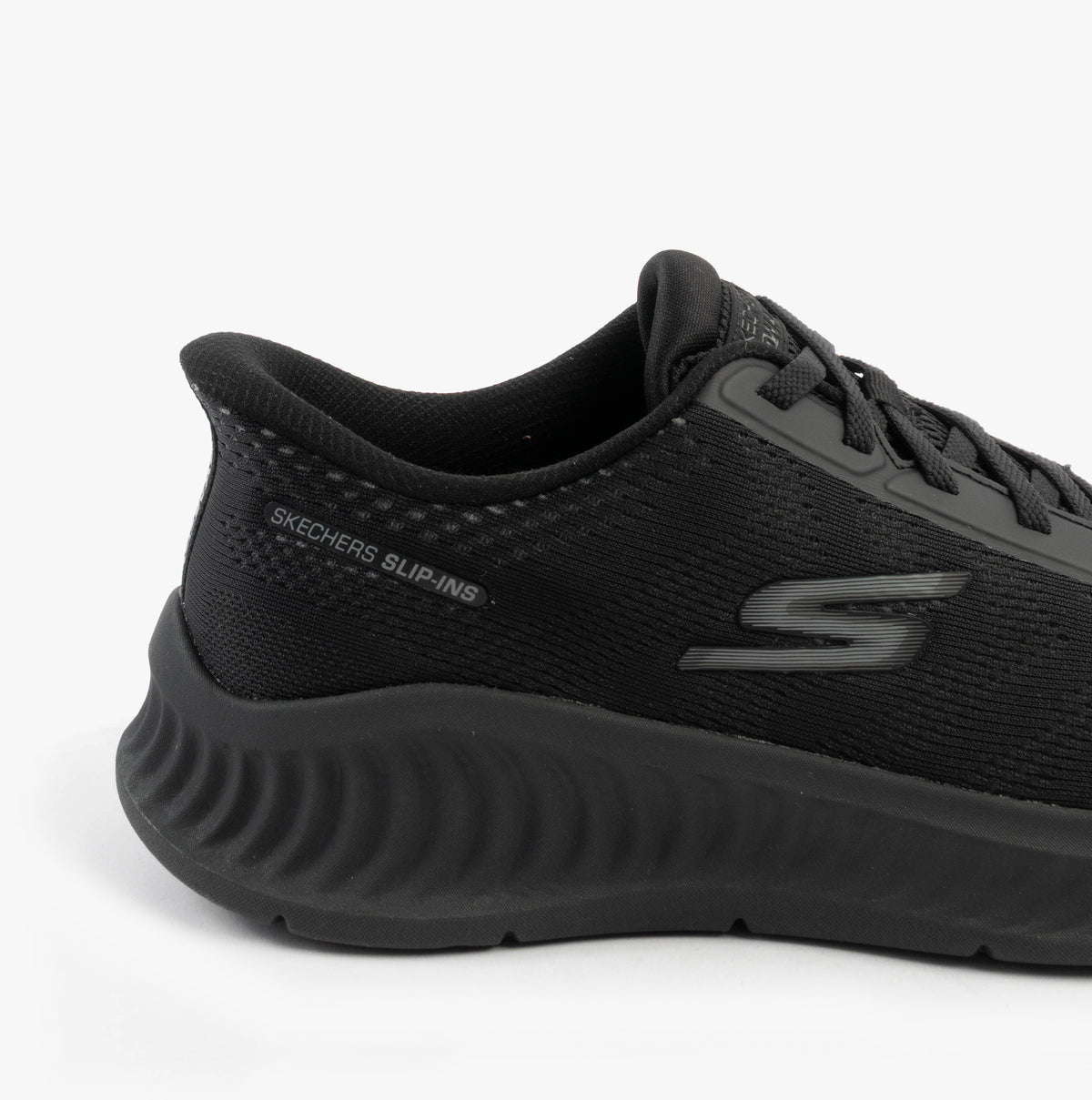 Skechers 216375/BBK GO WALK NOW - PAYTON Mens Trainers Black side view, showing upper mesh and rubber sole details.