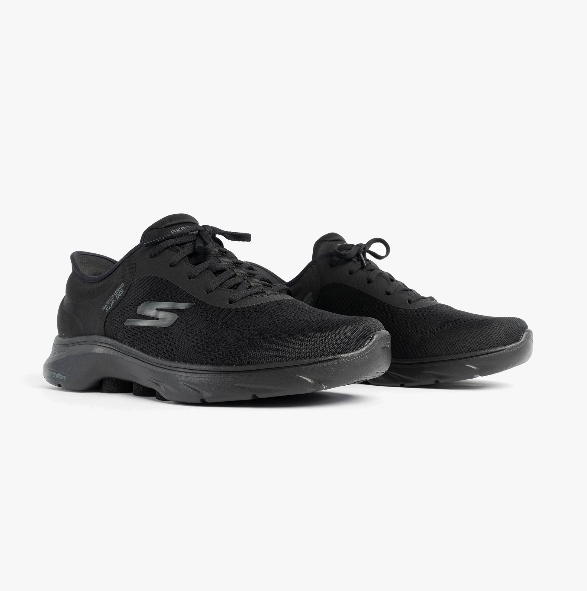 Skechers 216550/BBK GO WALK 7 - VALIN Mens Trainers Black side view, showcasing lace-up design and mesh upper.