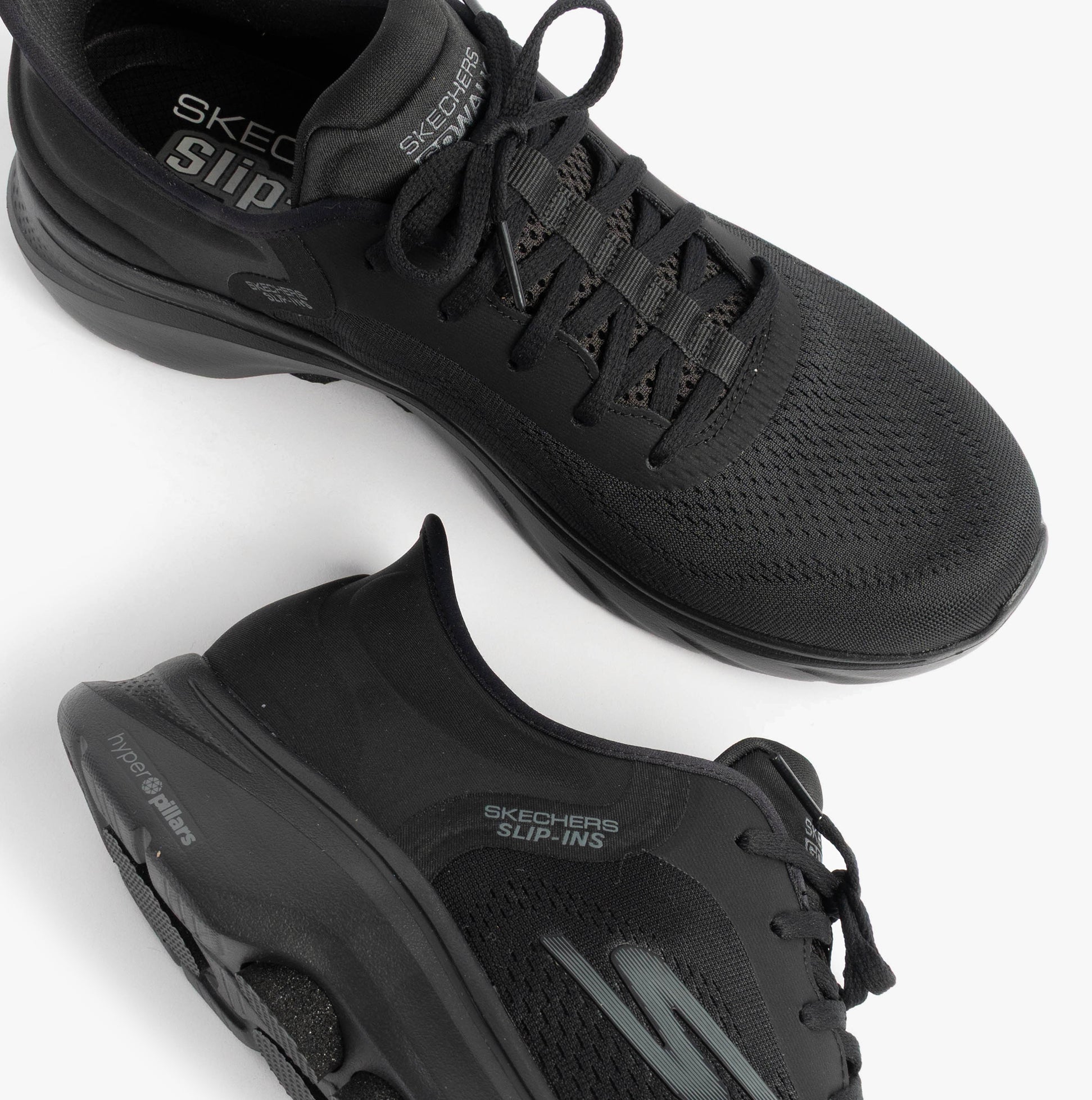 Skechers 216550/BBK GO WALK 7 - VALIN Mens Trainers Black top view showcasing breathable mesh and lace-up design.