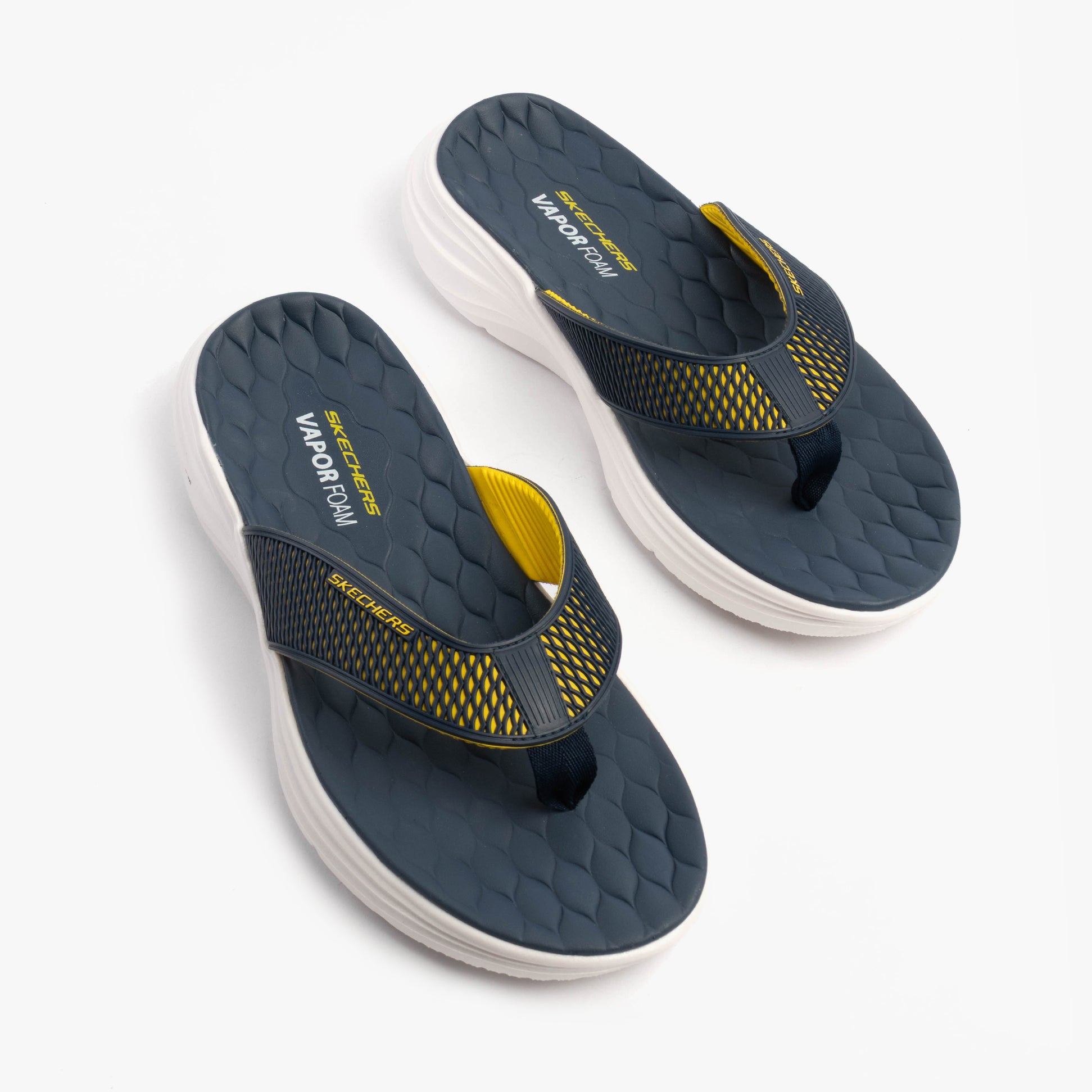 Skechers 232894/NVYL VAPOR FOAM SANDAL - SAYTO Mens Sandals Navy/Yellow top view showing the slip-on design and rubber sole.