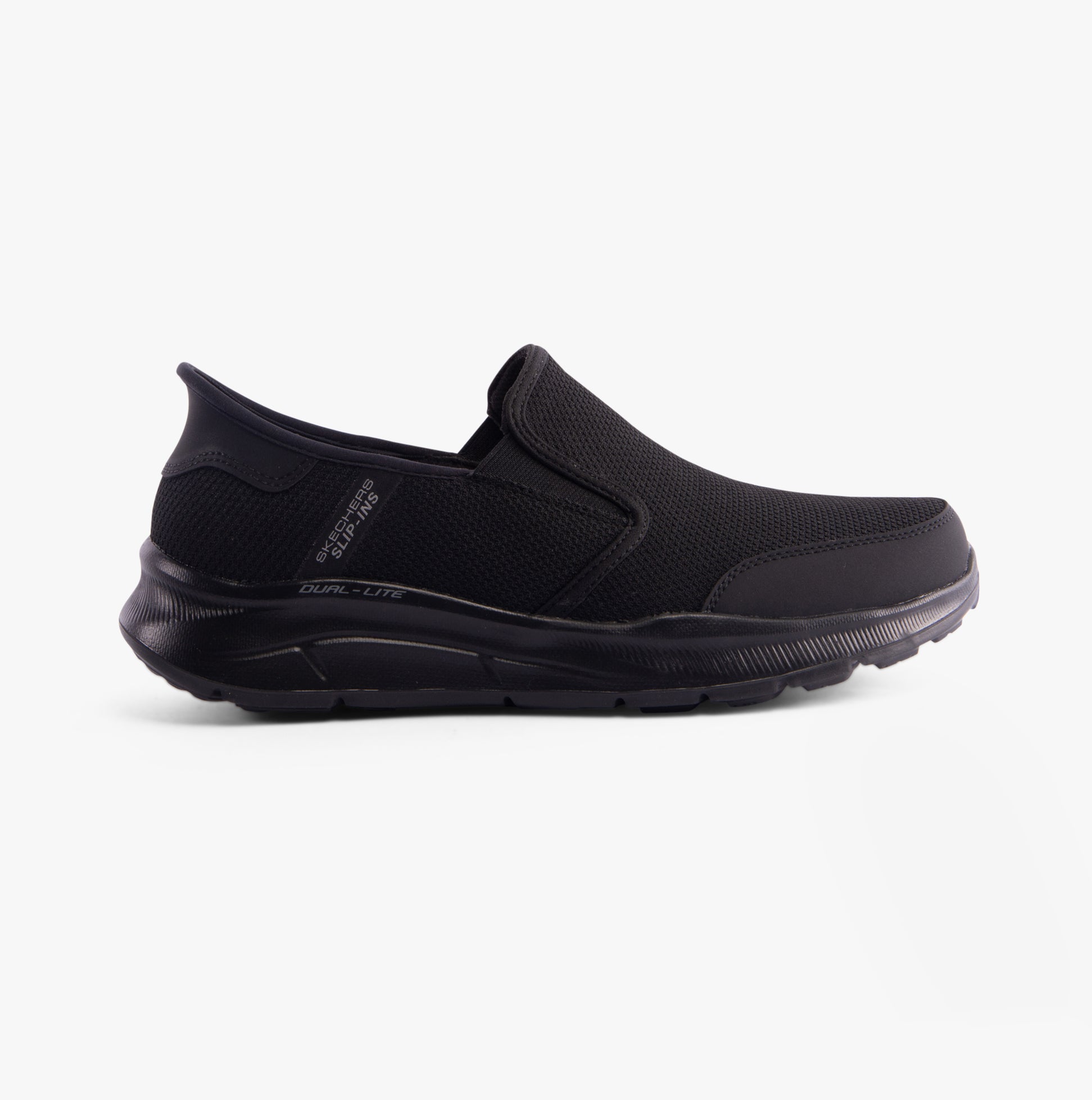 Skechers 232926/BBK EQUALIZER 5.0 - DRAYZE Mens Trainers Black side view showing breathable mesh upper and slip-on design.