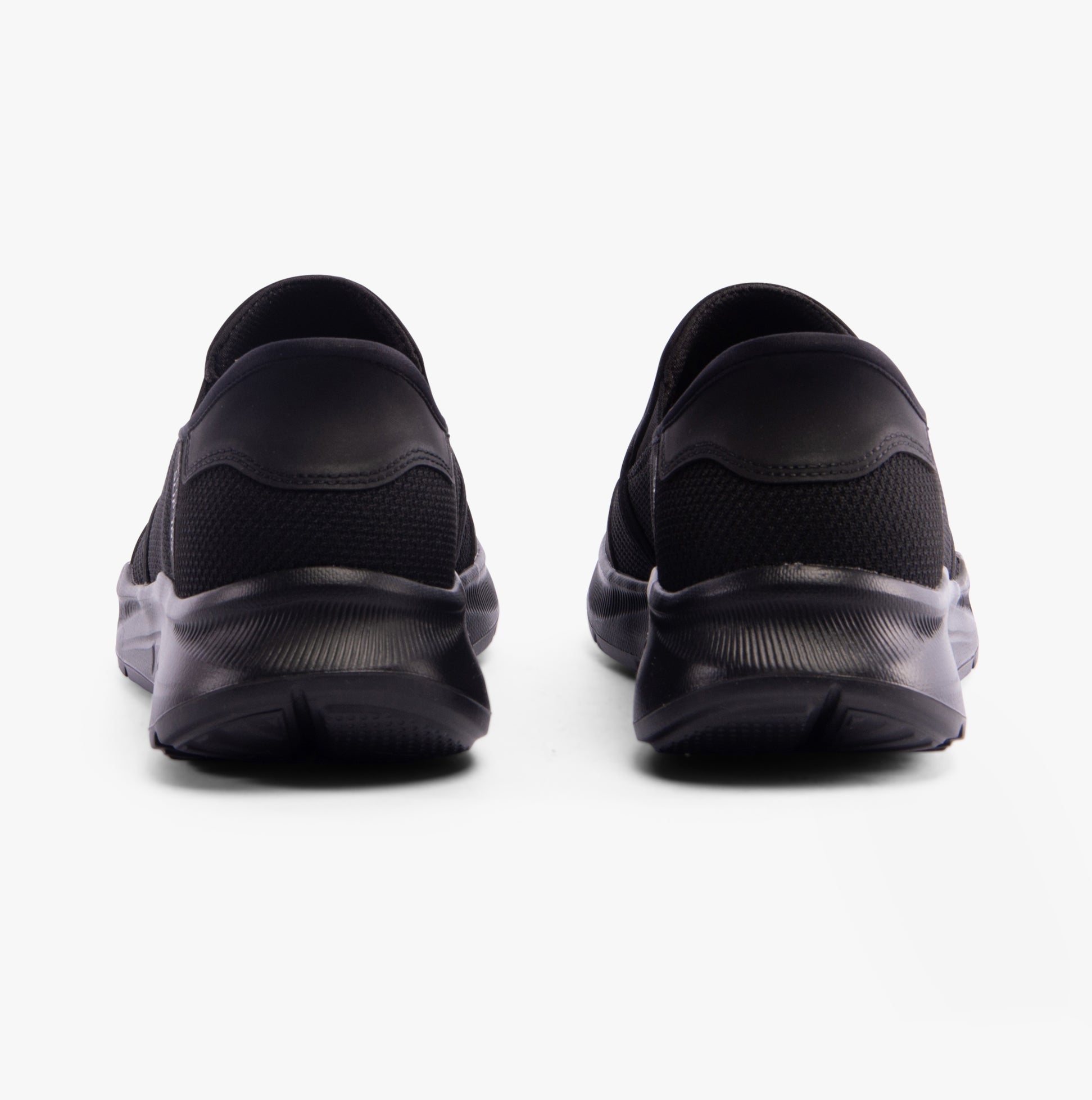 Skechers 232926/BBK EQUALIZER 5.0 - DRAYZE Mens Trainers Black rear view showing the slip-on design and low top silhouette.