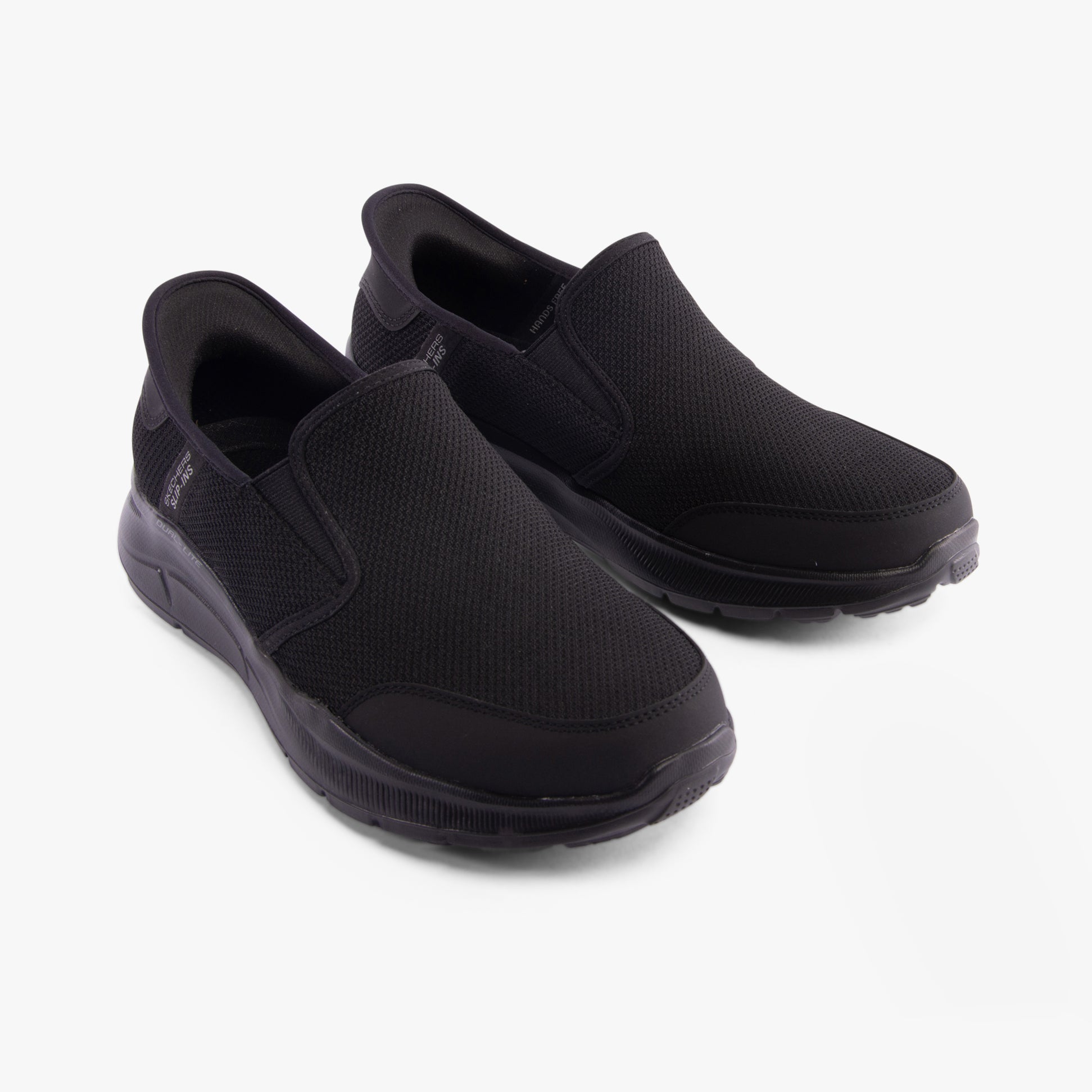 Skechers 232926/BBK EQUALIZER 5.0 - DRAYZE Mens Trainers Black side view with breathable mesh upper and slip-on design.